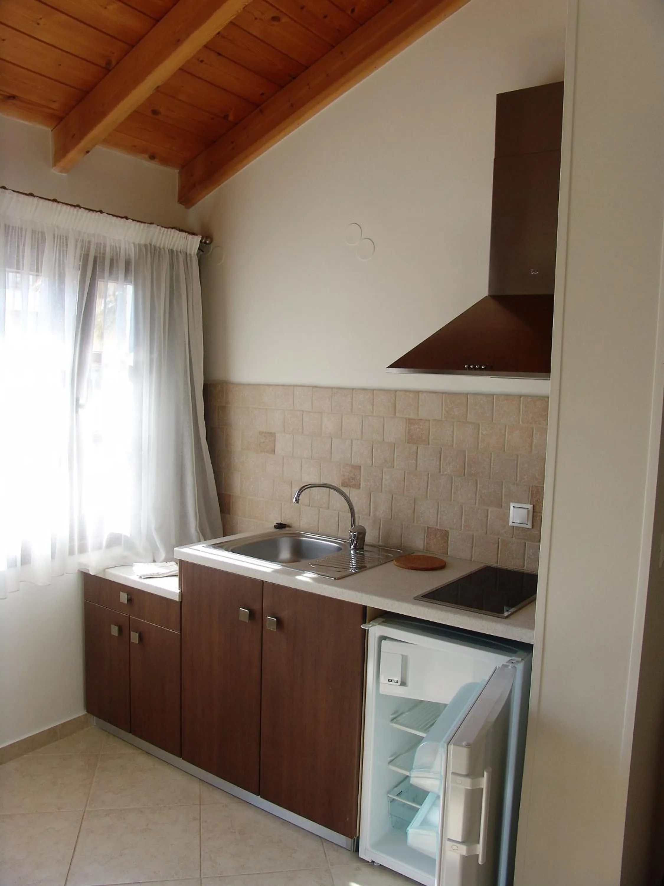 Kitchen or kitchenette in Notis Hotel