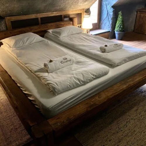 Bed in Excalibur miniHotel