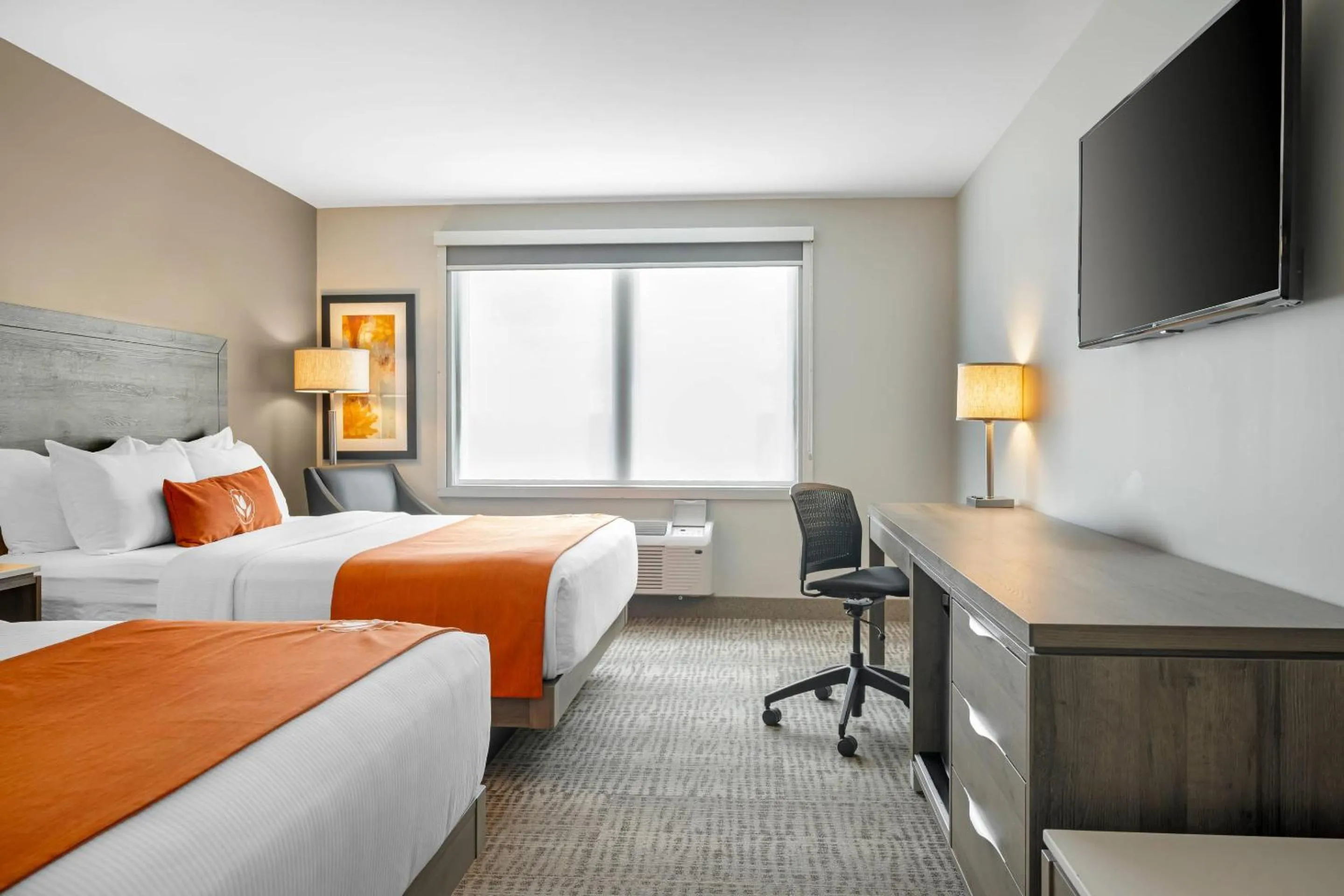 Bedroom, Bed in Amsterdam Inn & Suites, an Ascend Collection Hotel