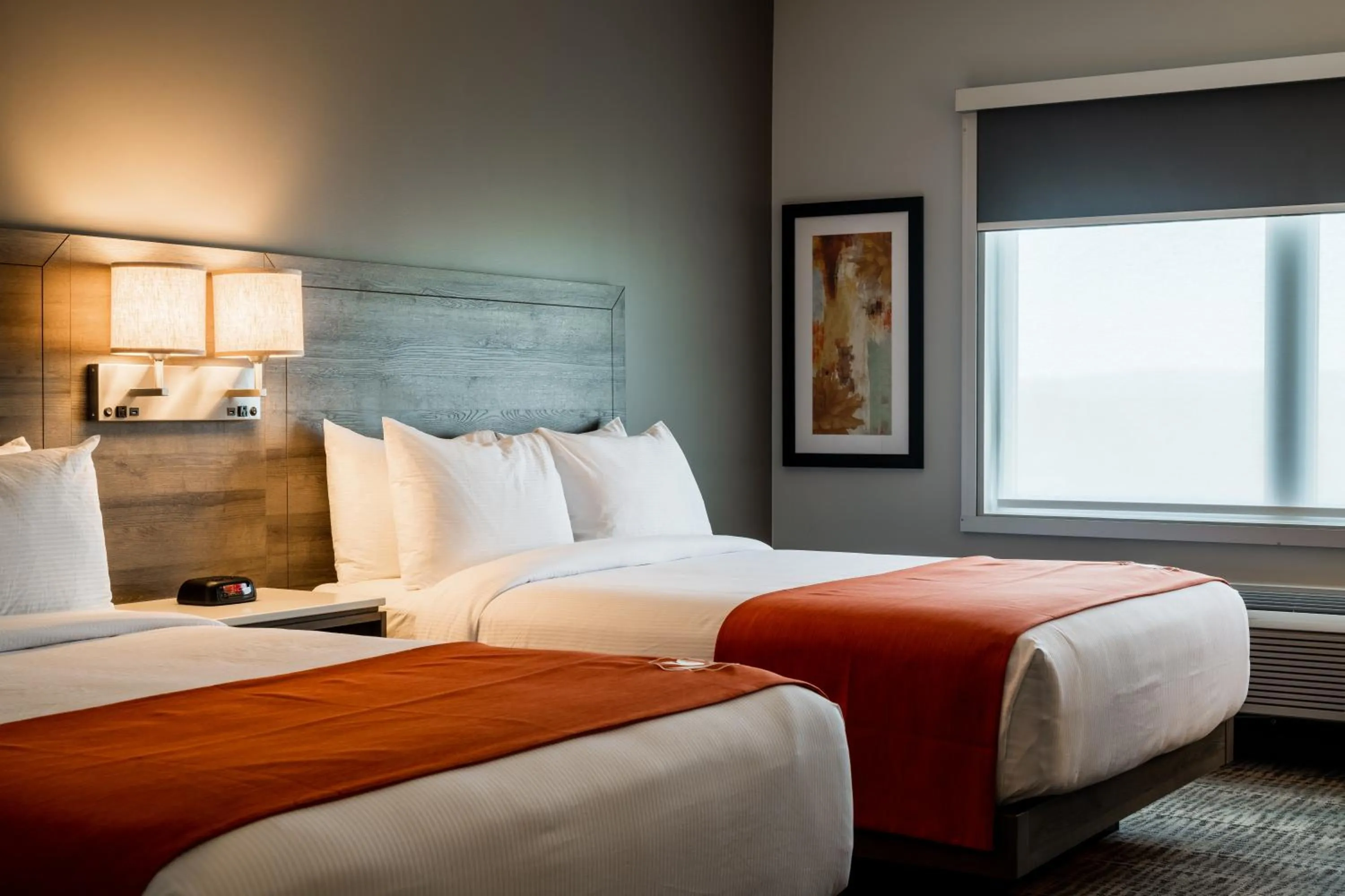 Bedroom, Bed in Amsterdam Inn & Suites, an Ascend Collection Hotel