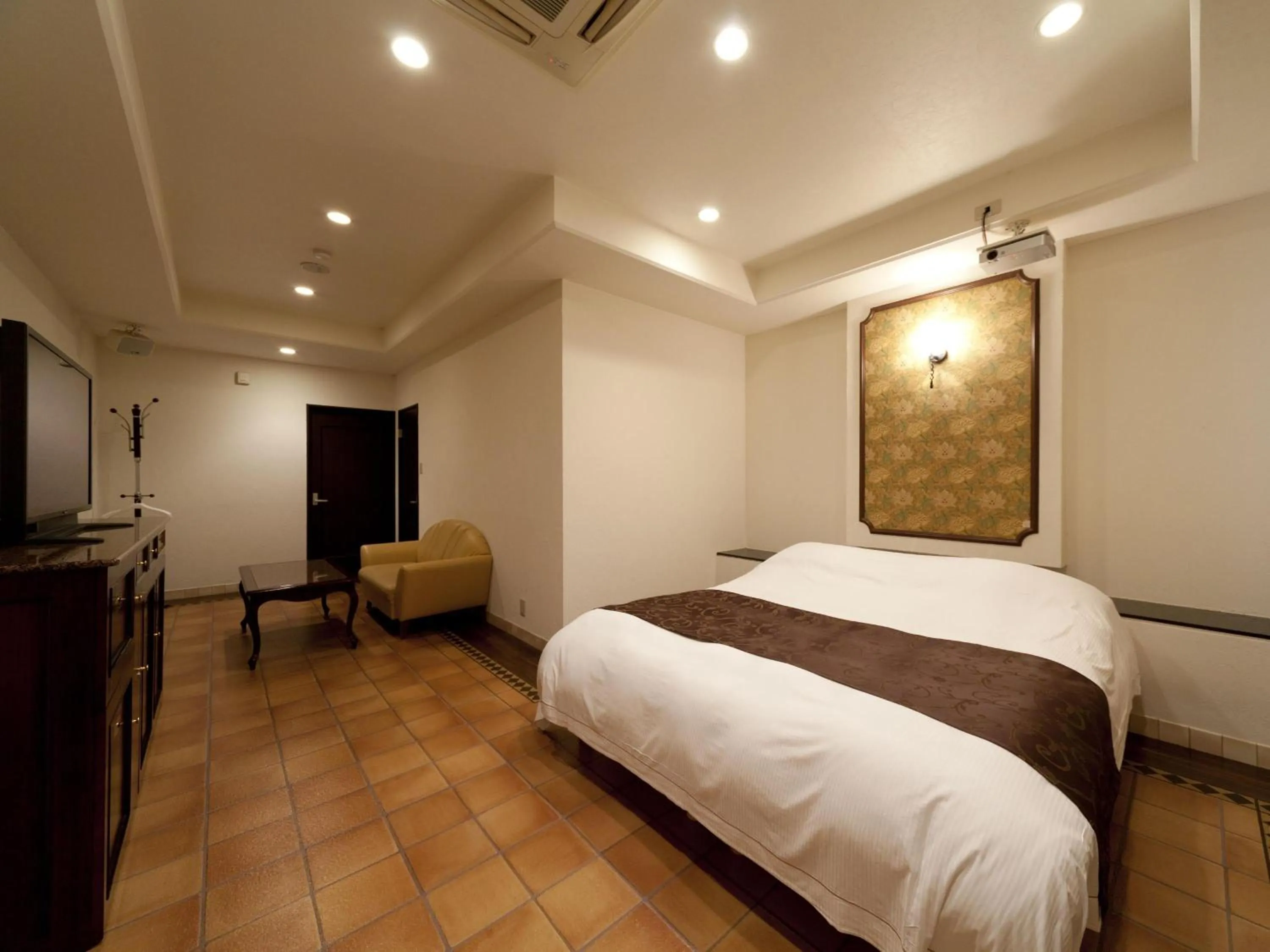 Photo of the whole room, Bed in Hotel Fine Garden Matsuzaka III