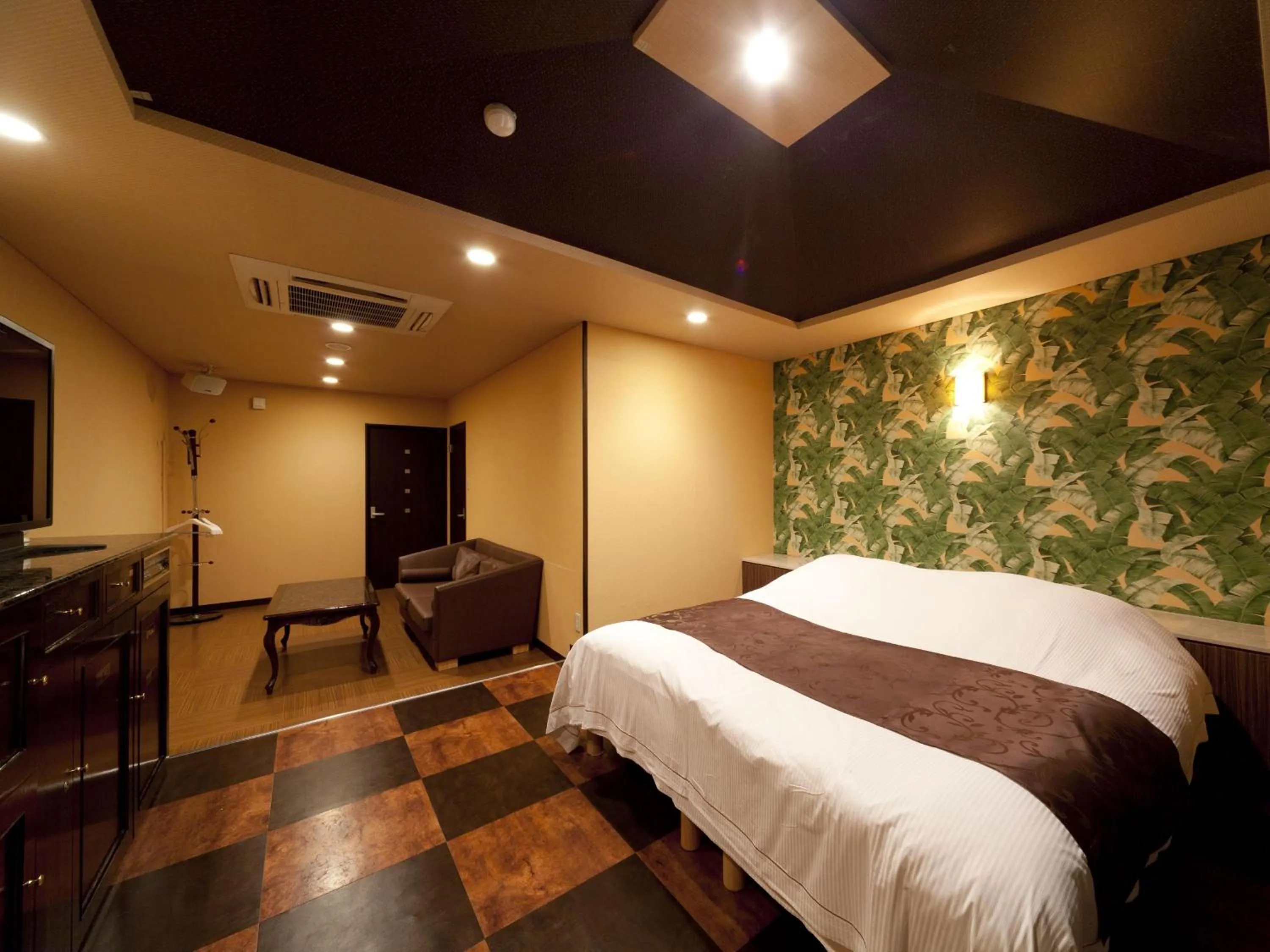 Photo of the whole room, Bed in Hotel Fine Garden Matsuzaka III