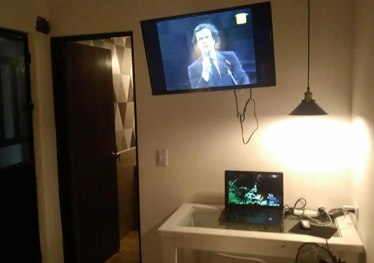 TV and multimedia in Casa hotel Mi Huila