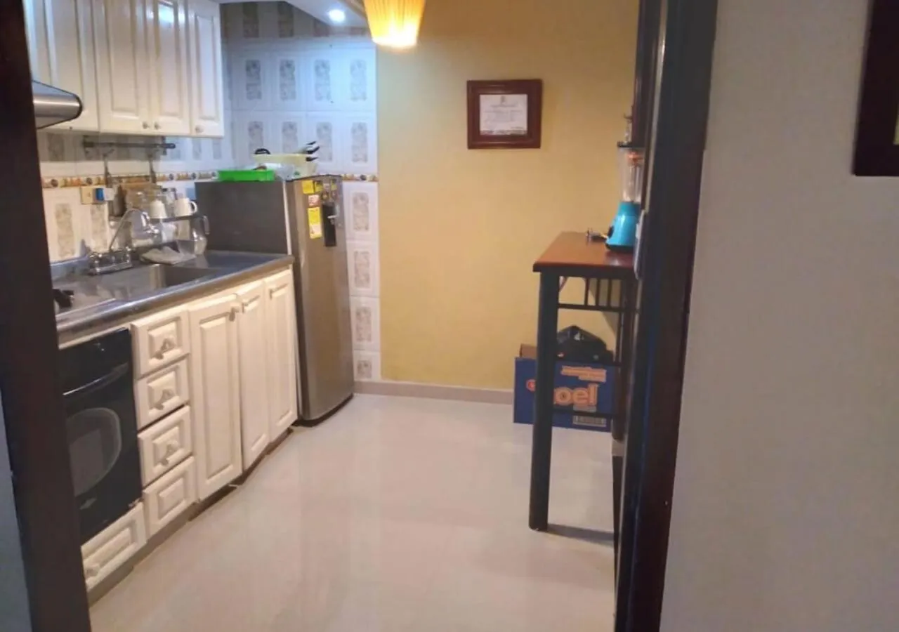 Kitchen or kitchenette in Casa hotel Mi Huila