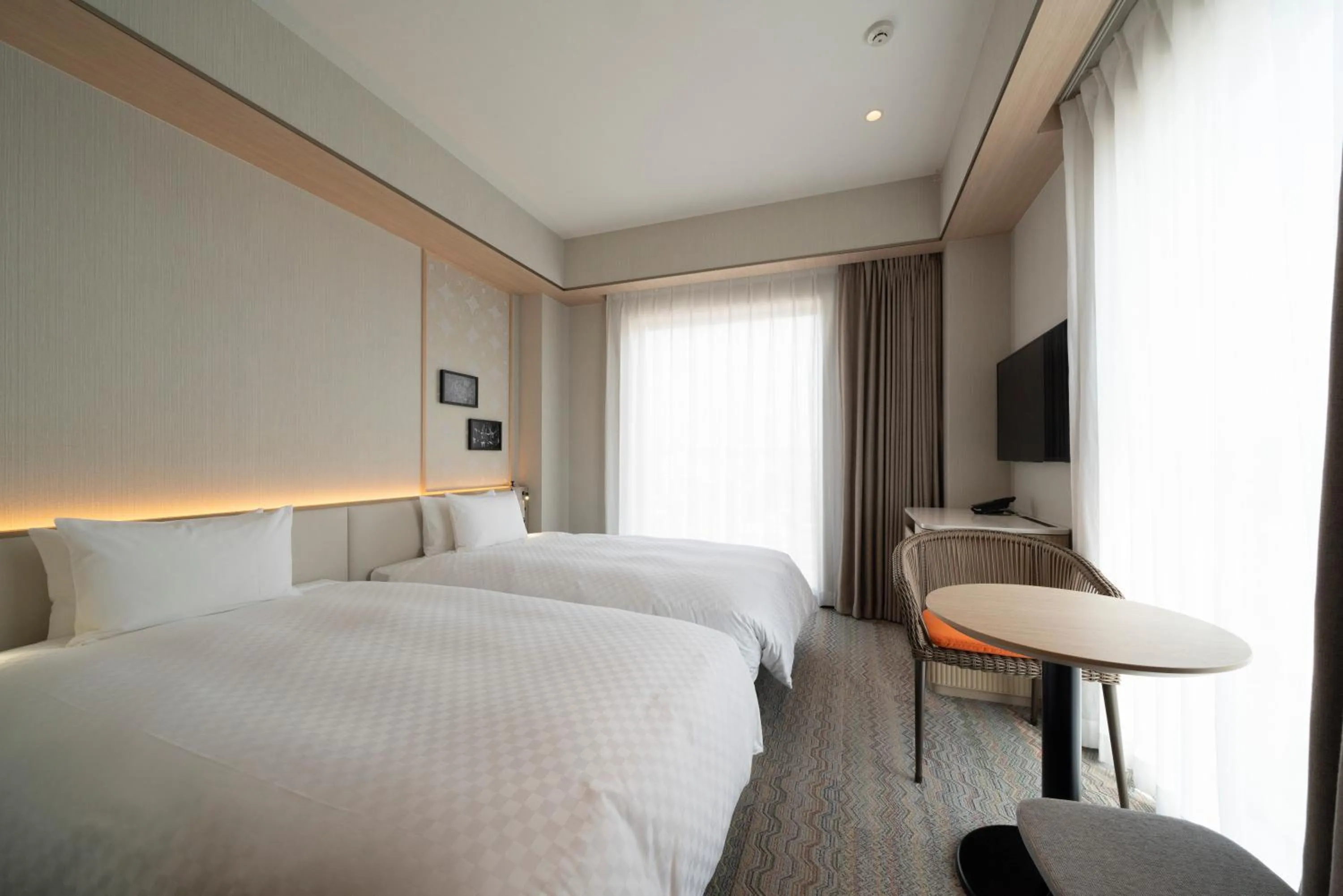 Photo of the whole room, Bed in HOTEL μ STYLE INUYAMA experience