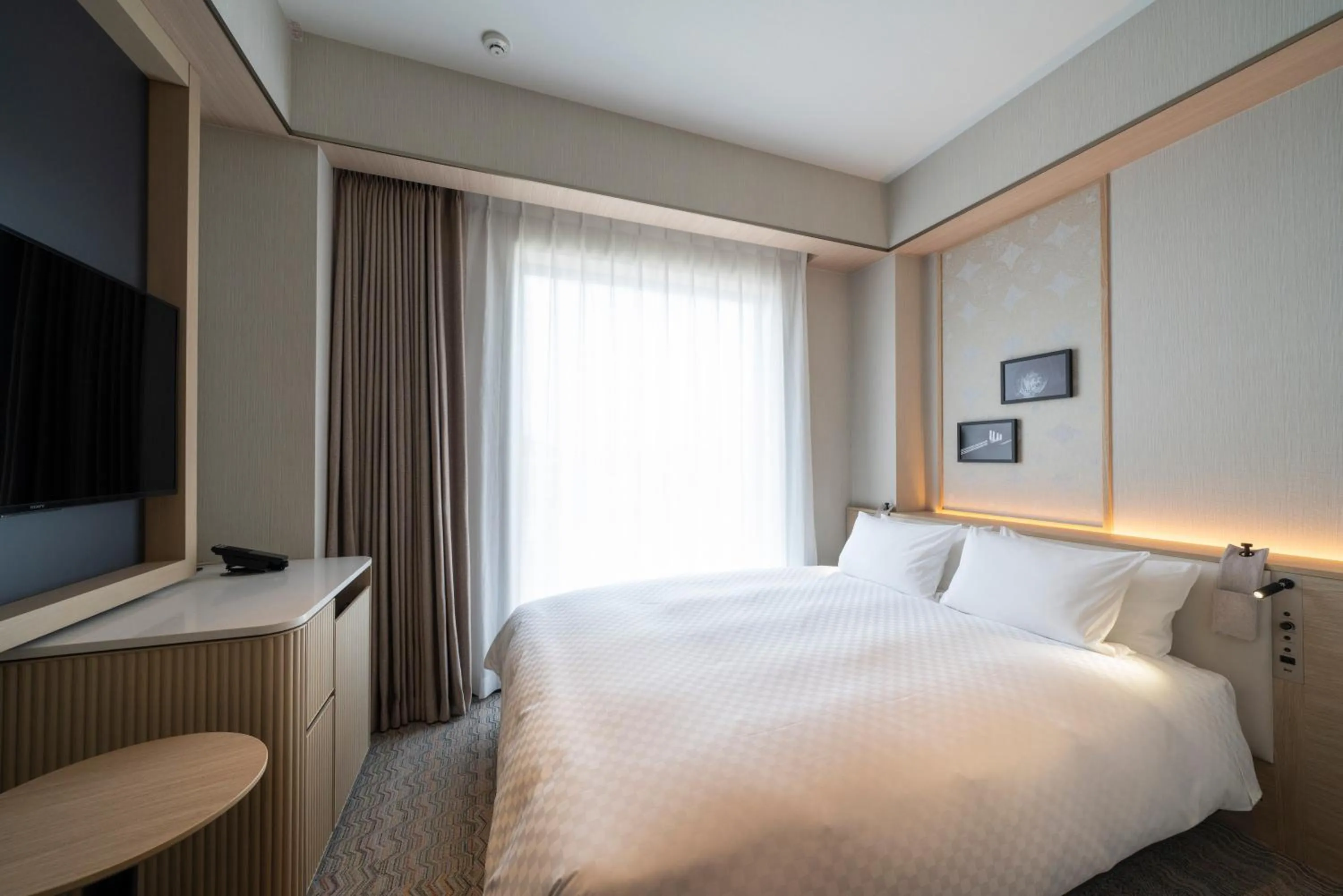 Photo of the whole room, Bed in HOTEL μ STYLE INUYAMA experience