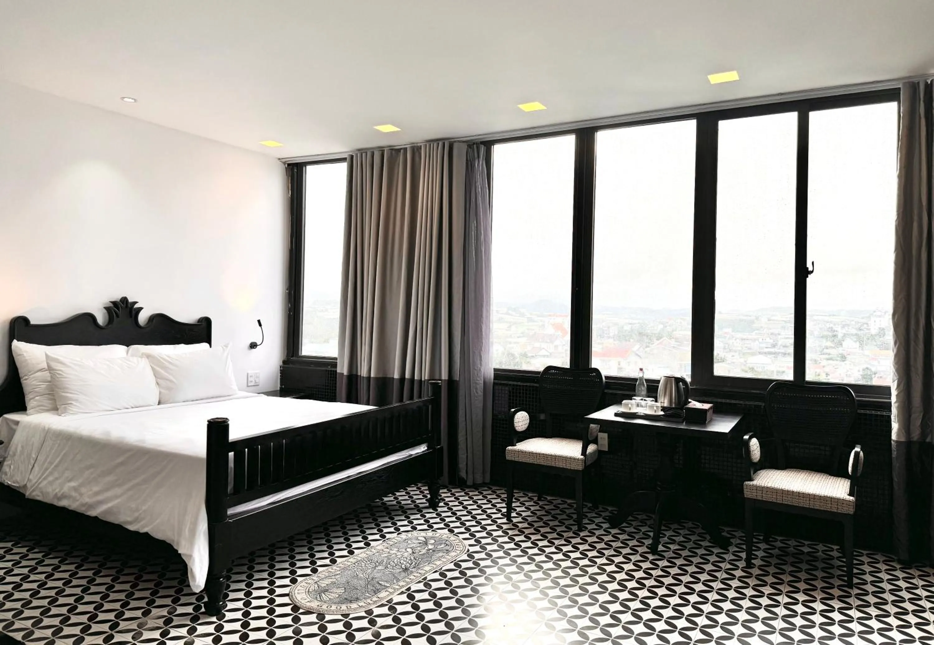 Bed in TTR Skypool View Hotel