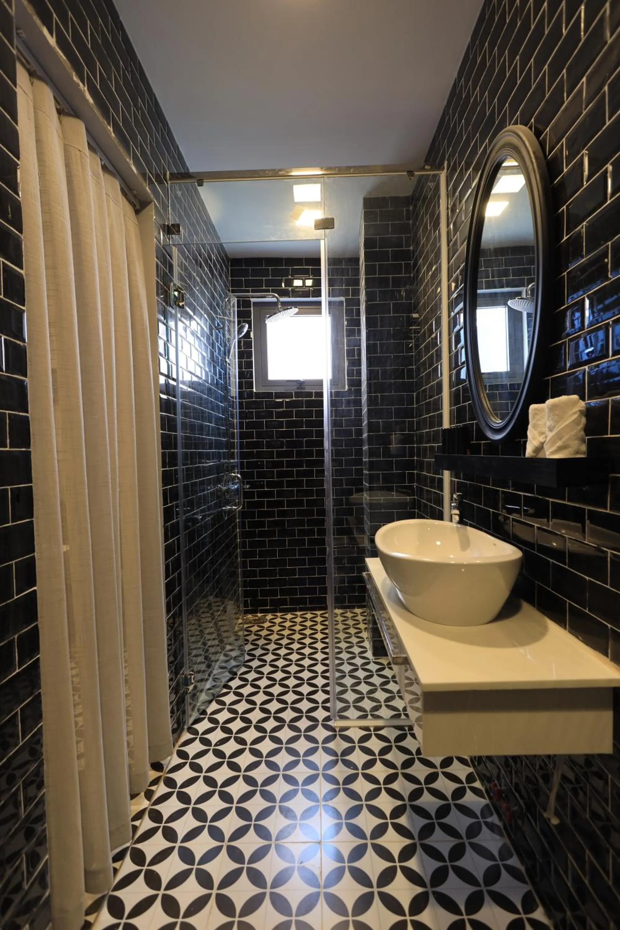 Bathroom in TTR Skypool View Hotel