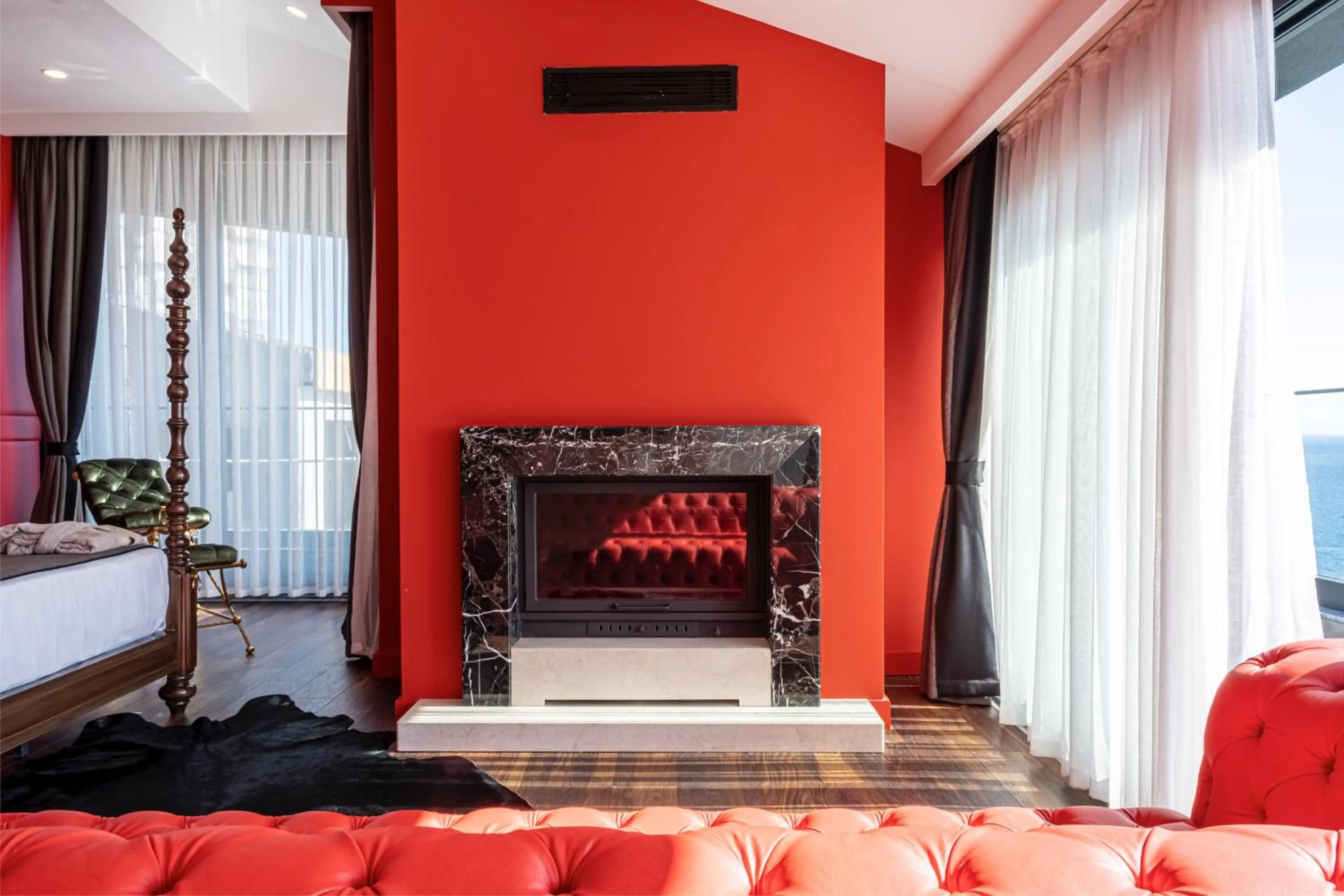 fireplace, Bed in Lucky Monkey Hotel