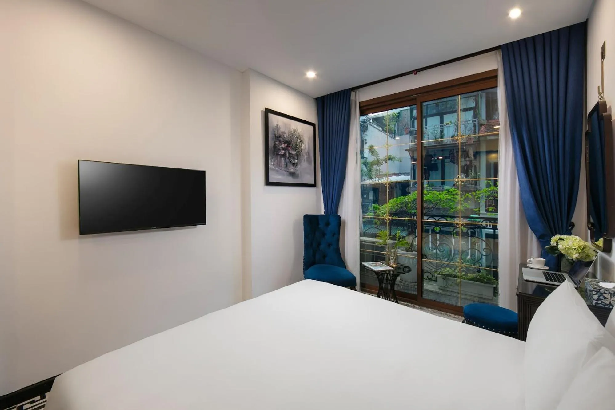 View (from property/room), Bed in Carillon Boutique Hotel