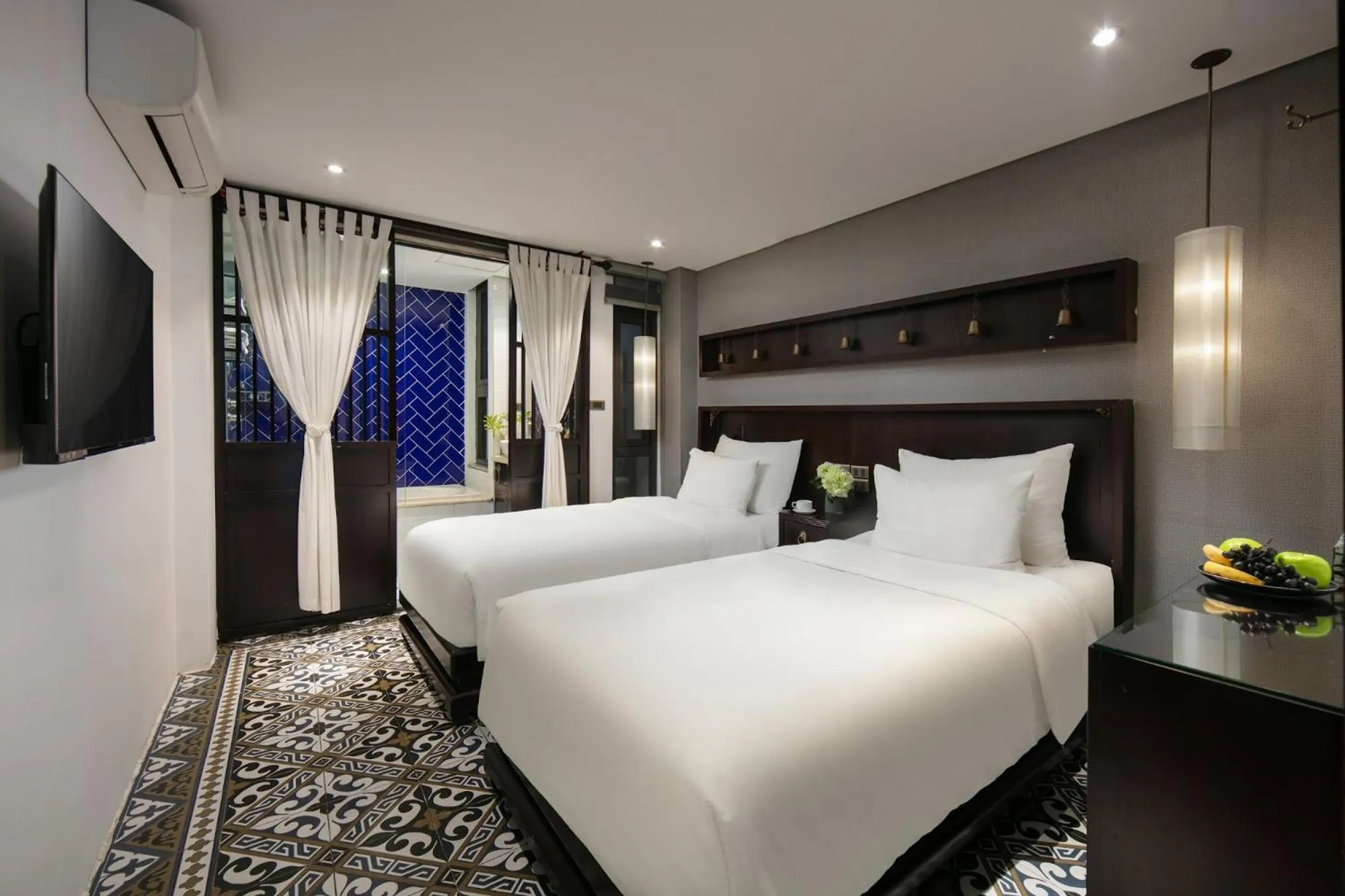 TV and multimedia, Bed in Carillon Boutique Hotel