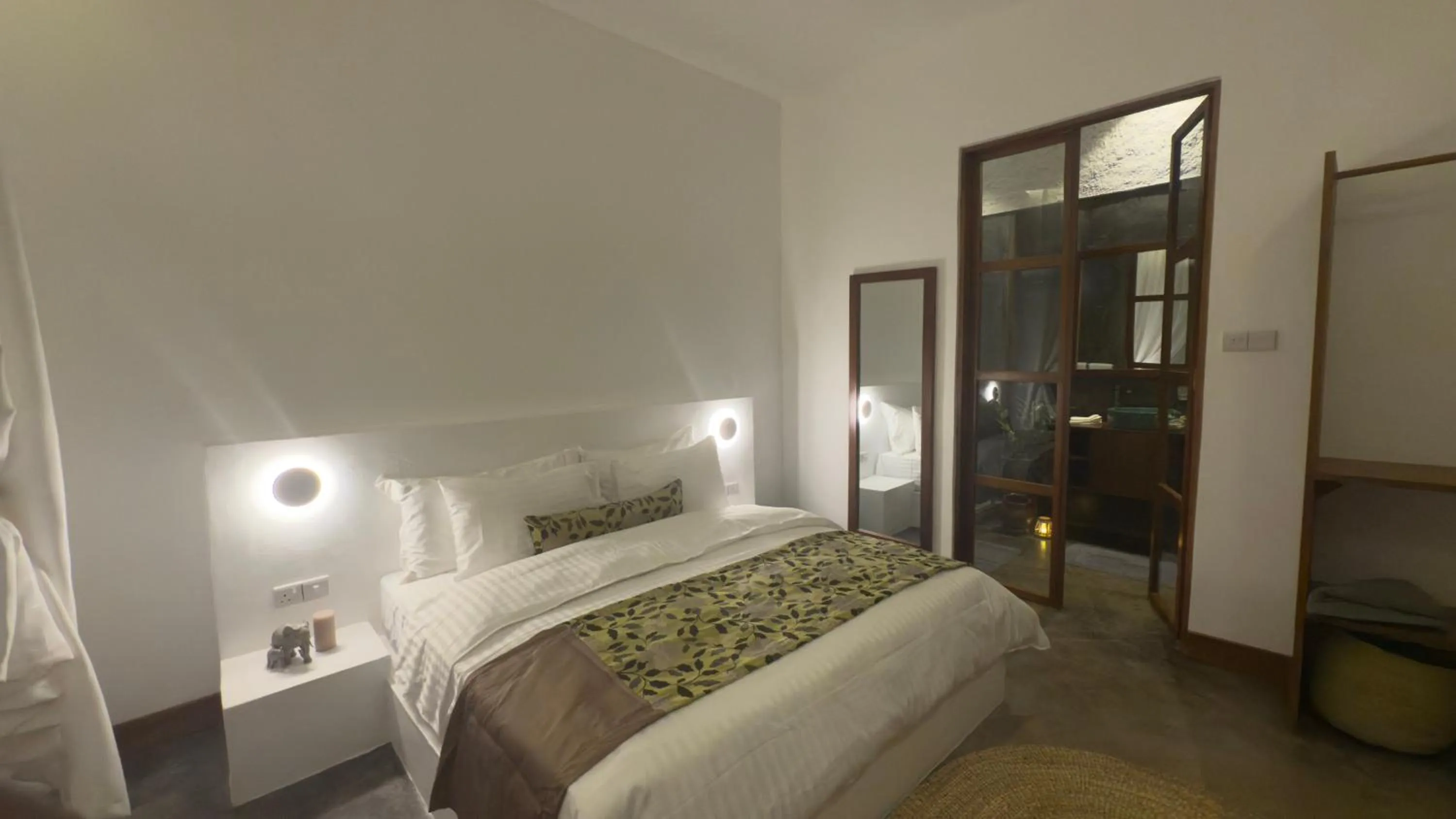 Bed in Tulivu Kilimanjaro Retreat