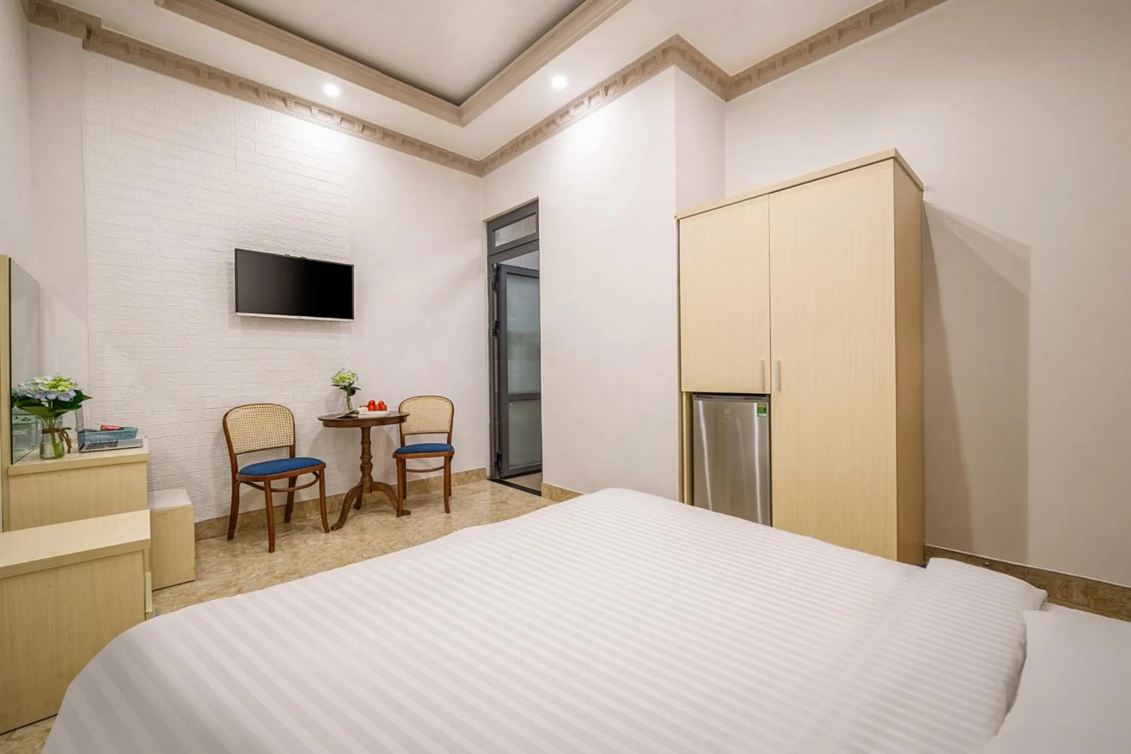 Communal lounge/ TV room, Bed in AN Boutique Hotel