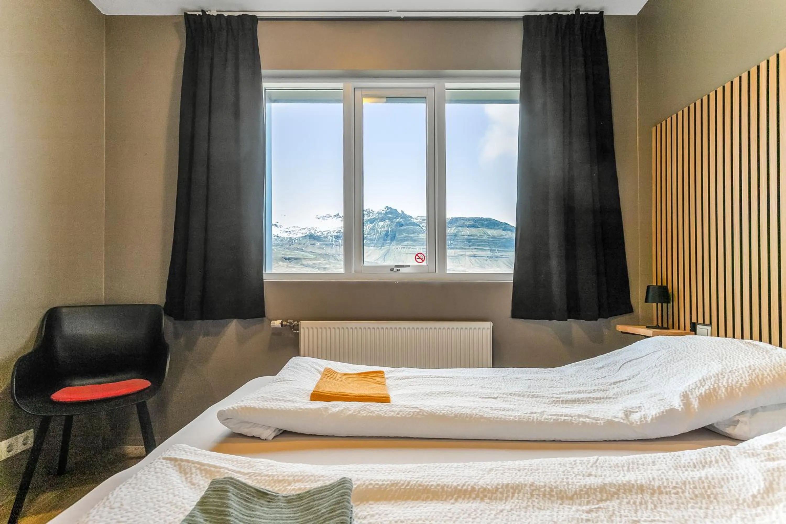 Bed in Stöð Guesthouse and apartments