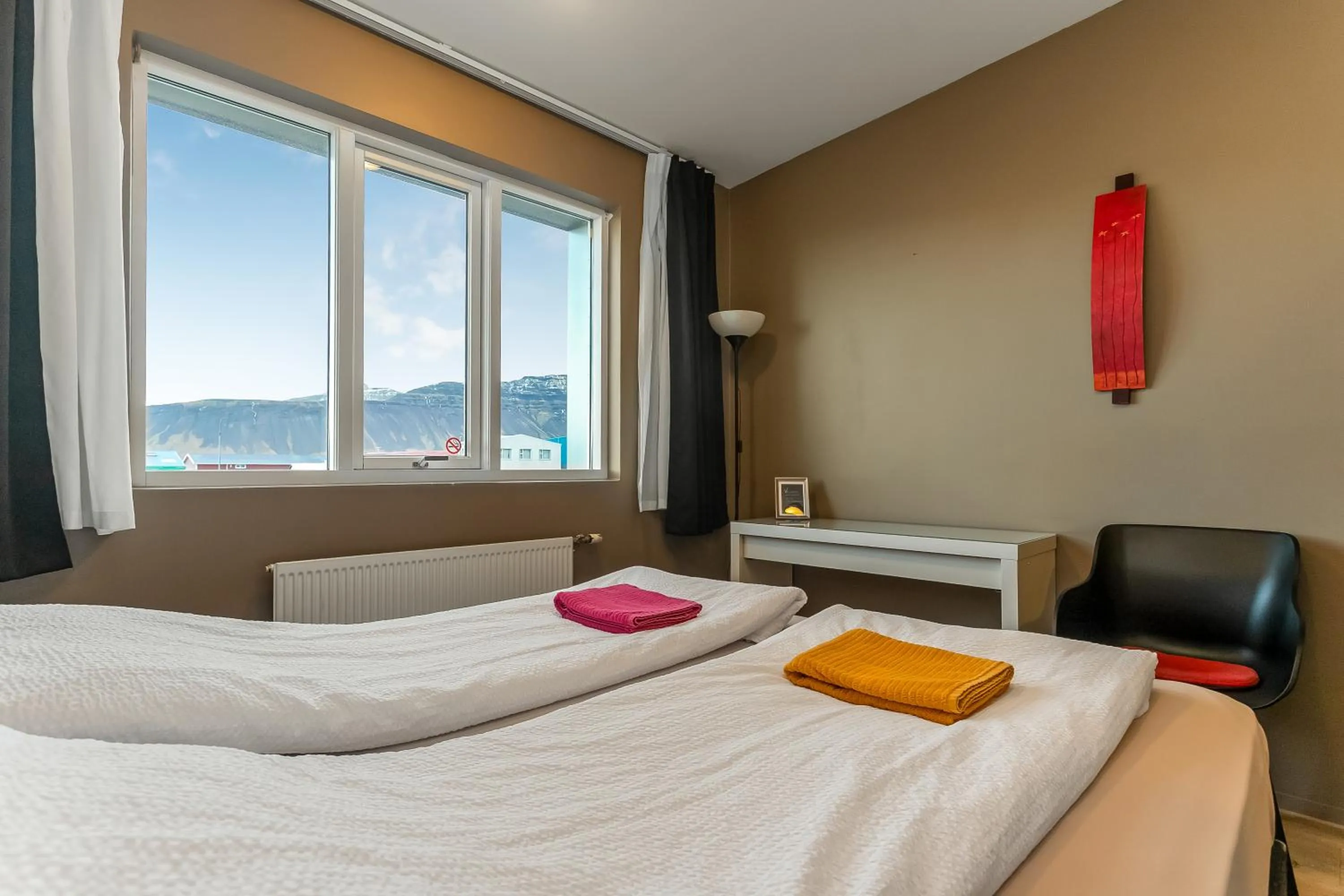 Bed in Stöð Guesthouse and apartments