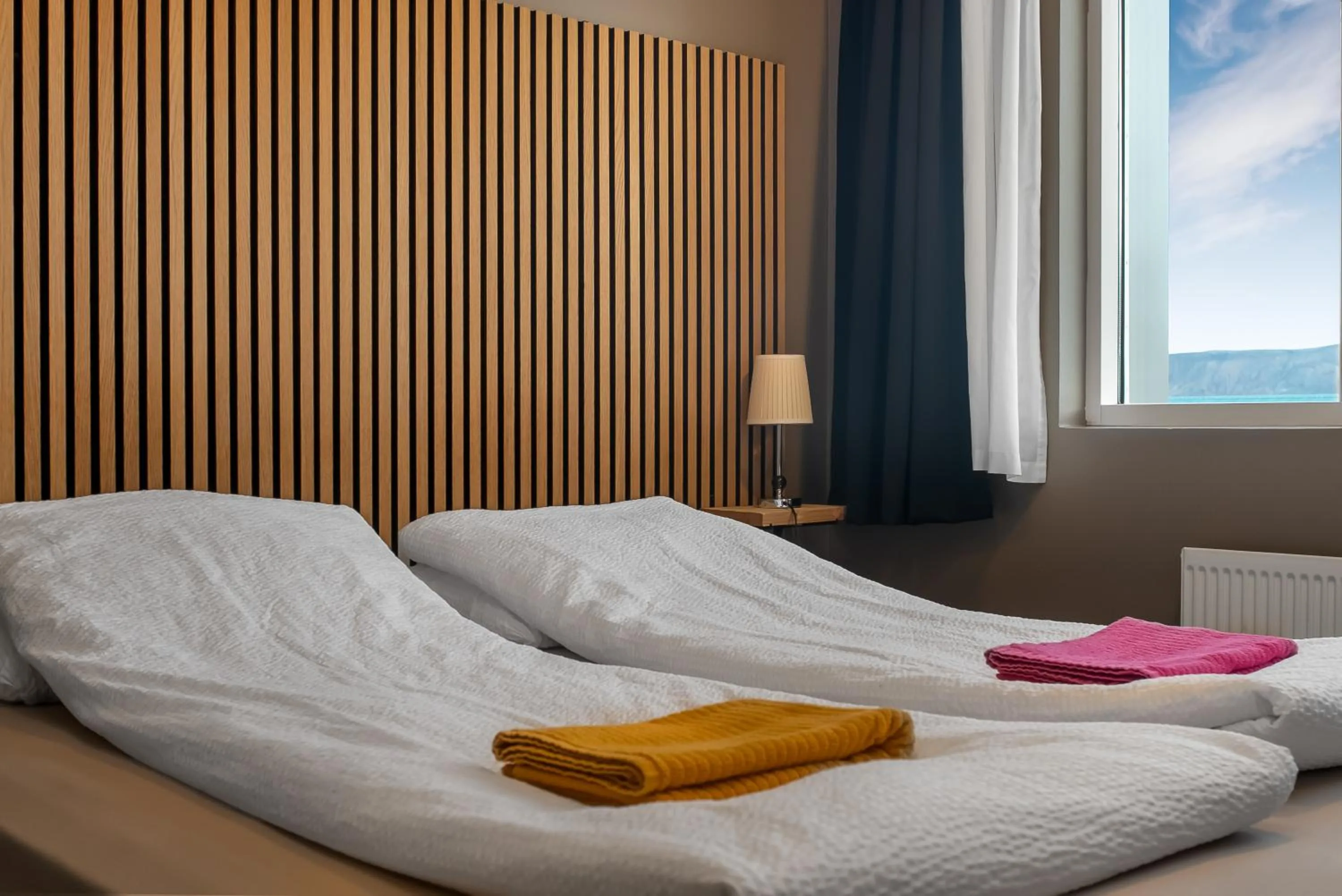 Bed in Stöð Guesthouse and apartments