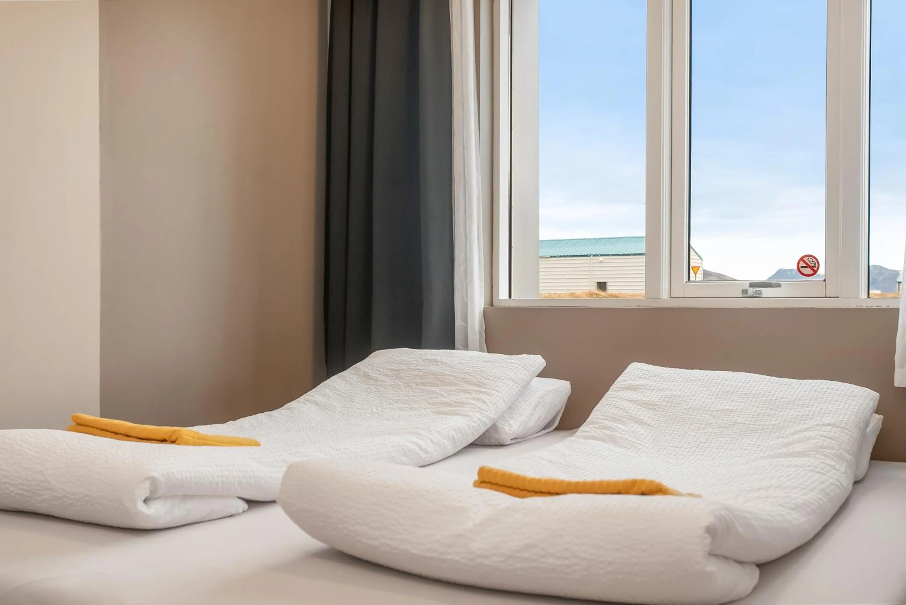 Bed in Stöð Guesthouse and apartments