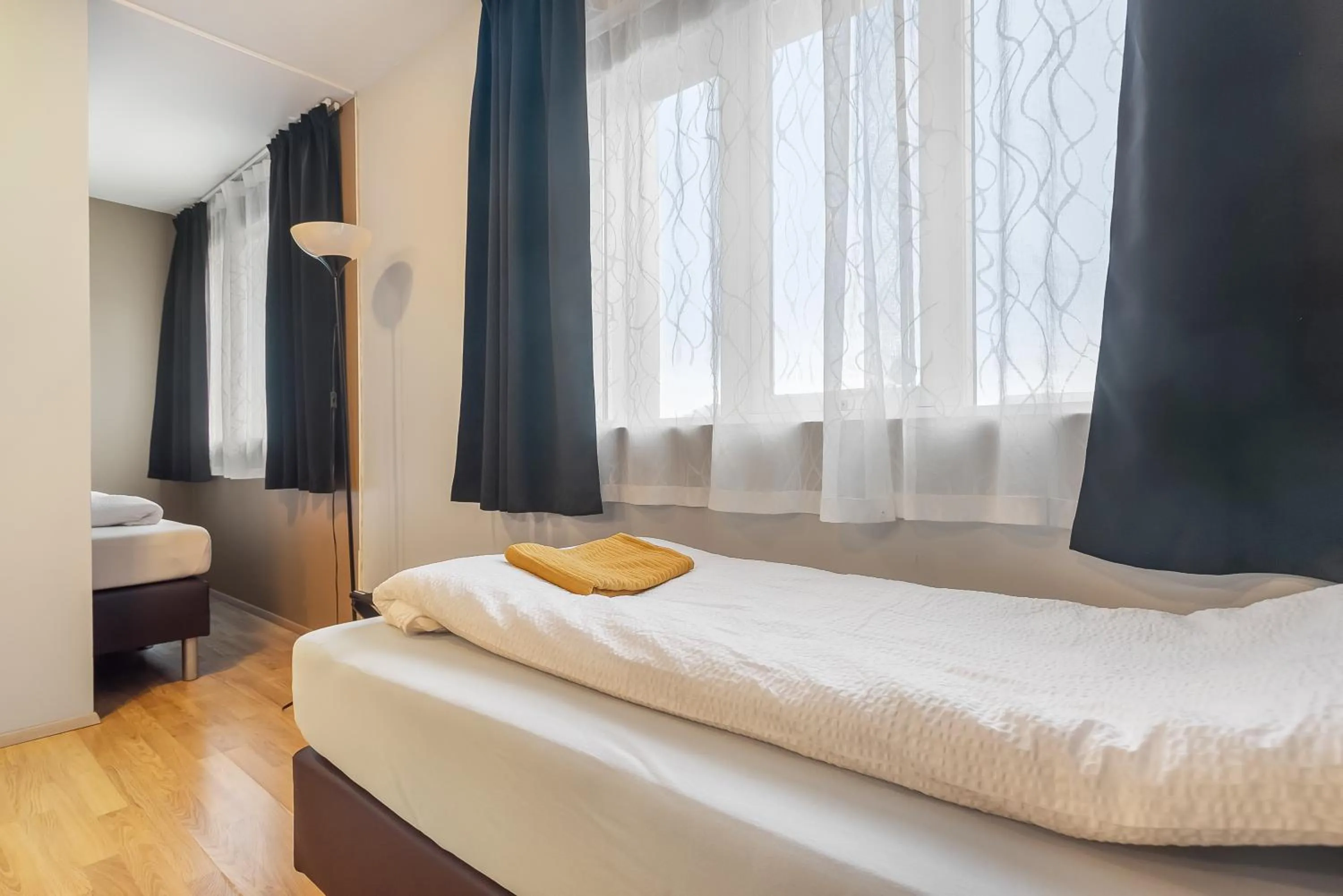 Bed in Stöð Guesthouse and apartments