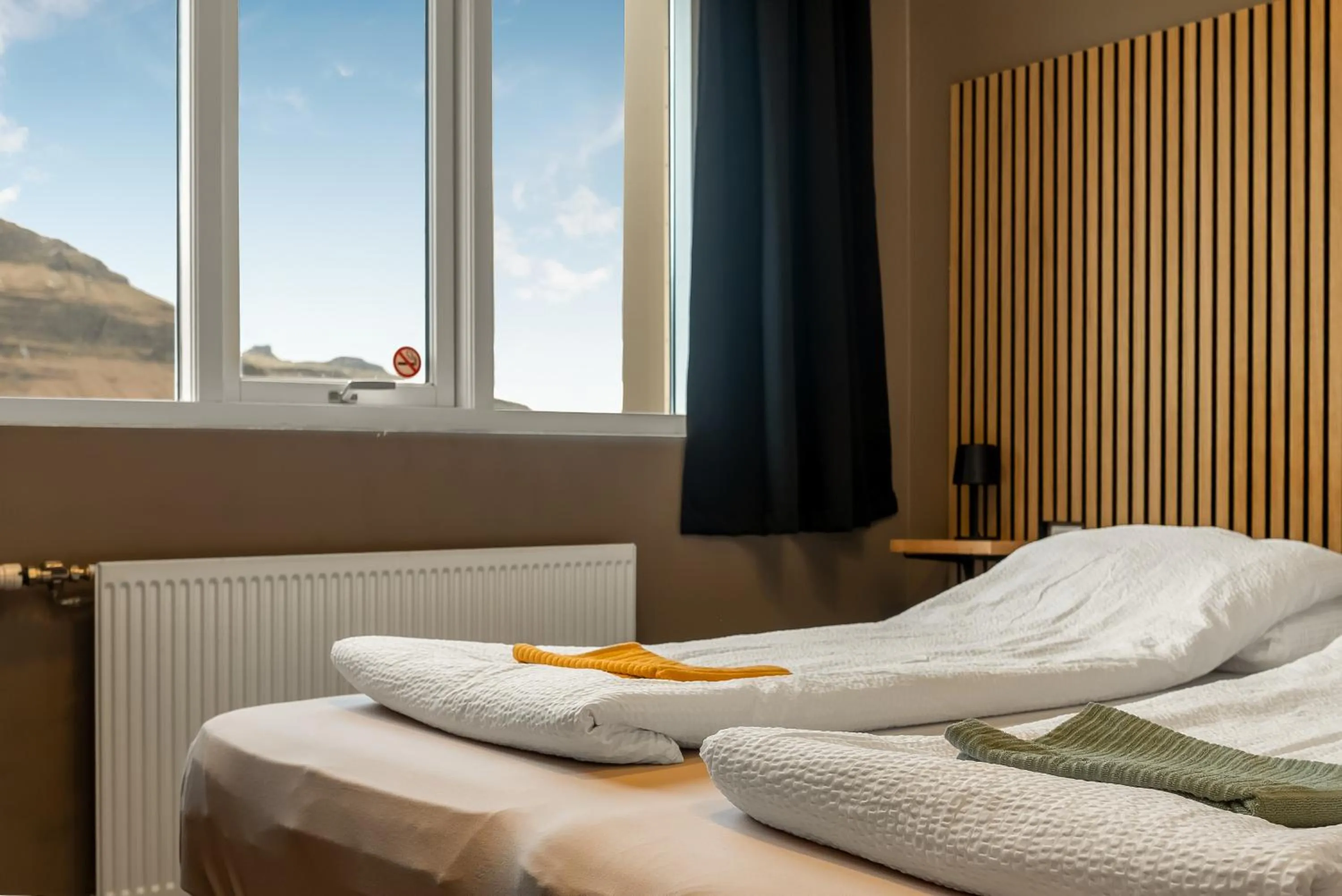 Bed in Stöð Guesthouse and apartments