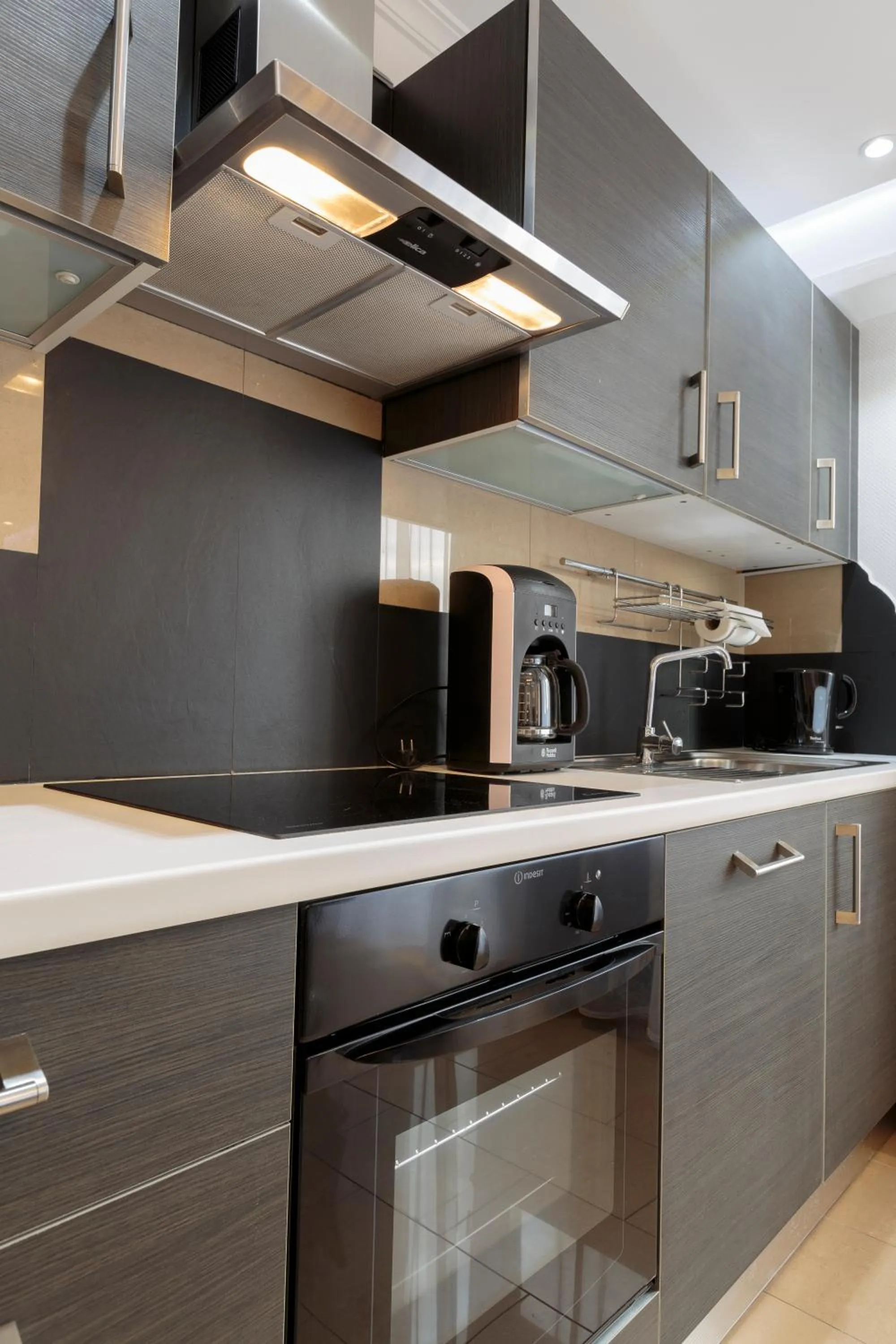 Kitchen or kitchenette in The Queen Luxury Apartments - Villa Giada