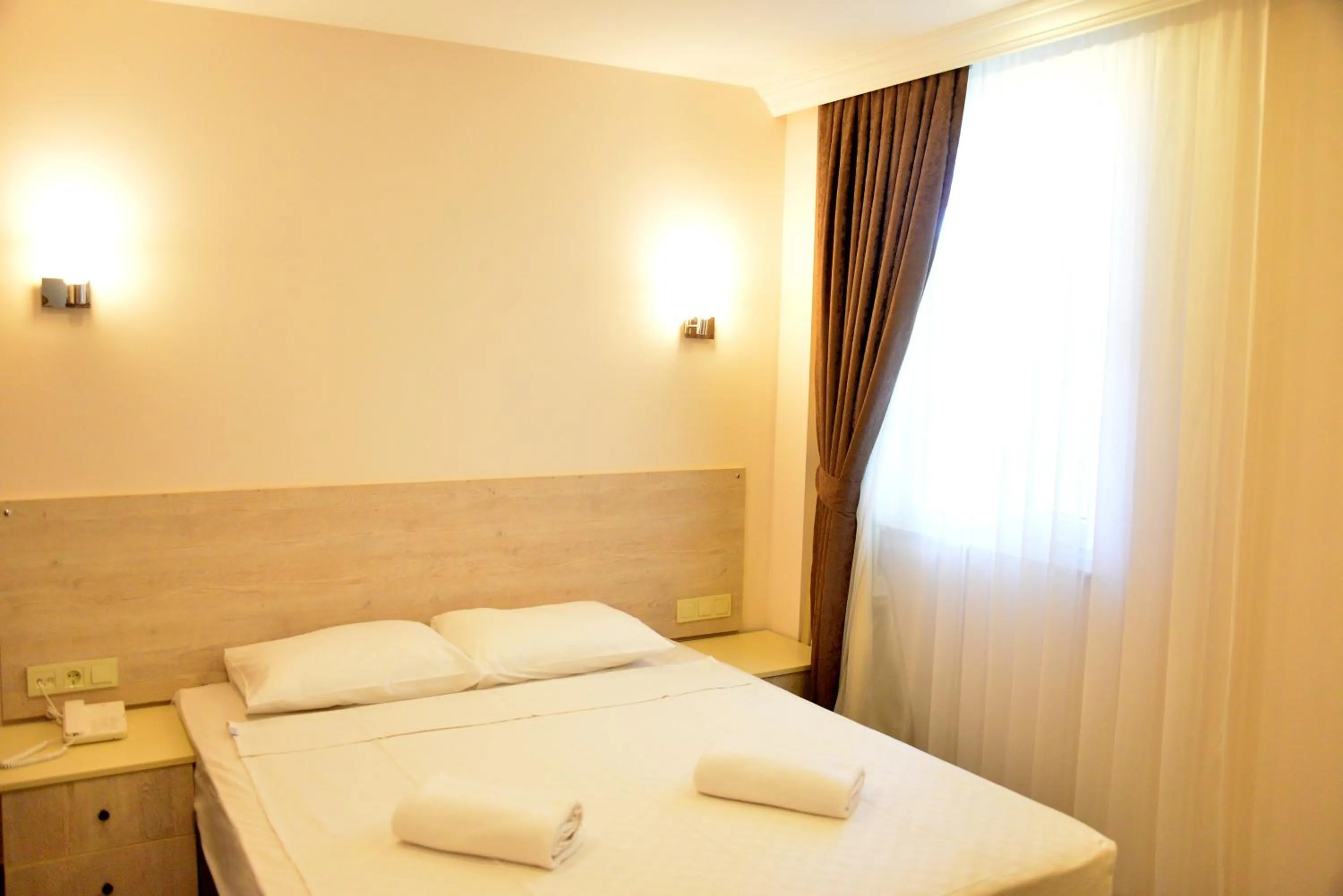 Bed in Dream Town Hotel&Restaurant