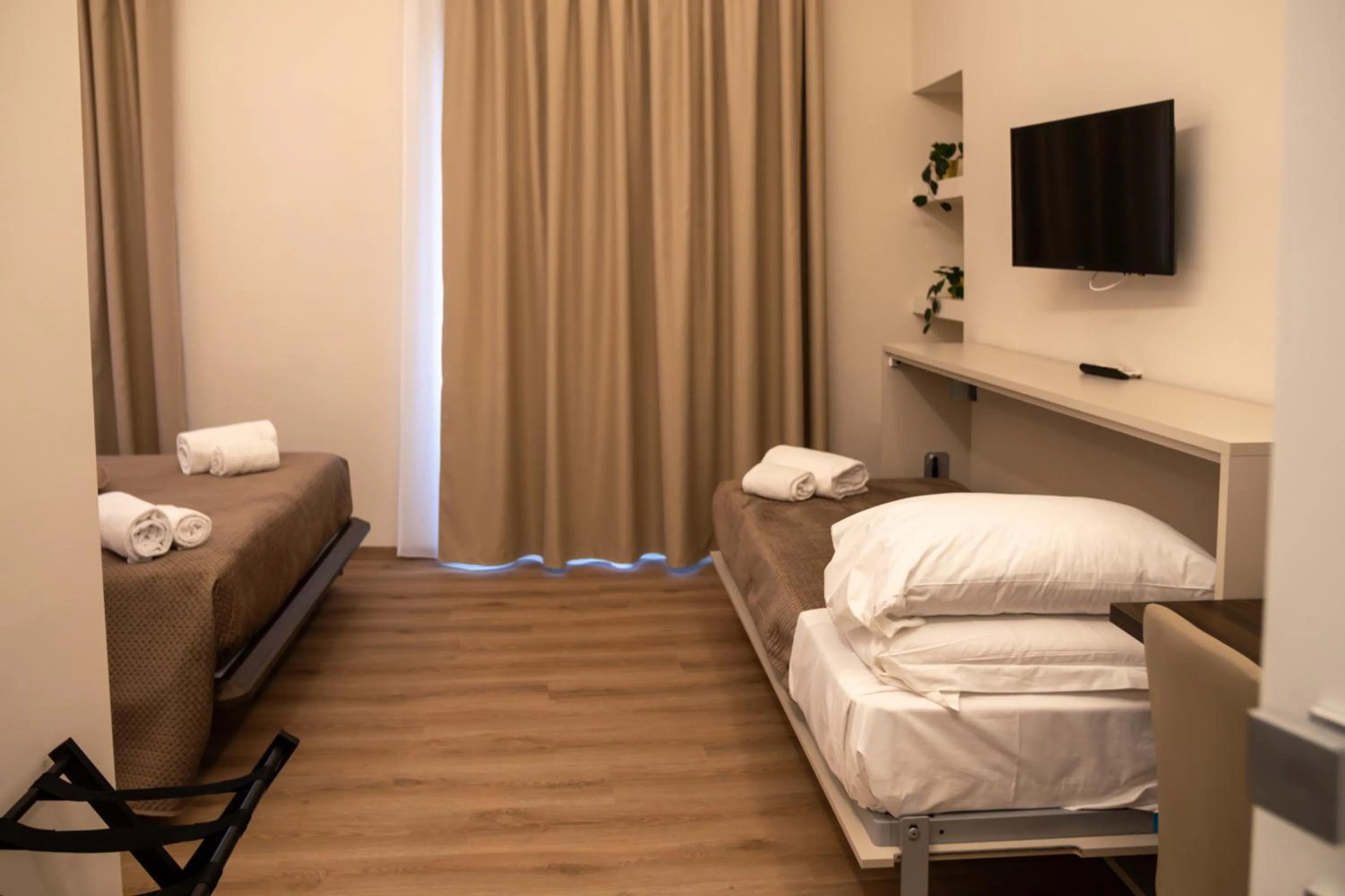 Bed in Palazzo Cappuccini Art Relais