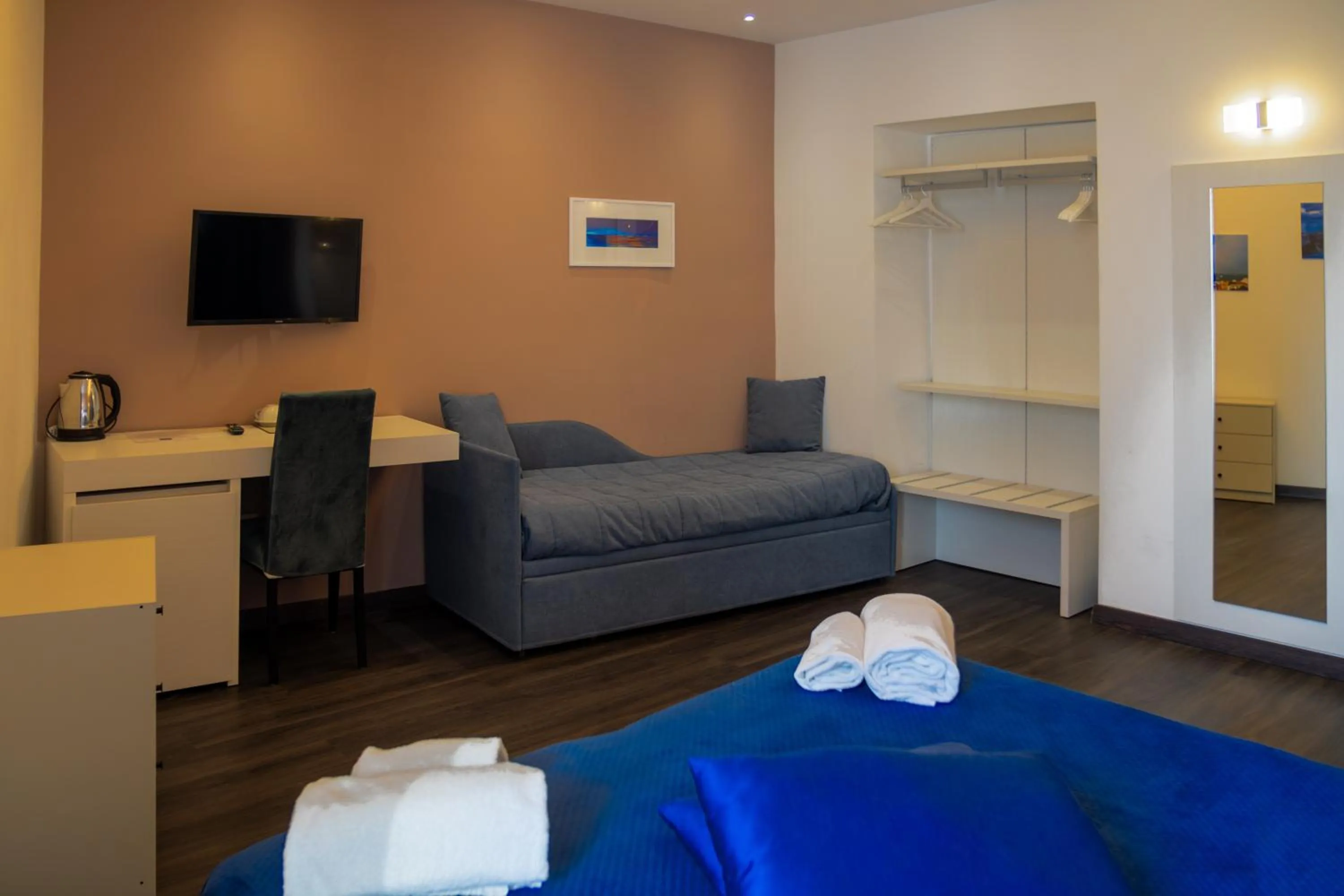 Bed in Palazzo Cappuccini Art Relais