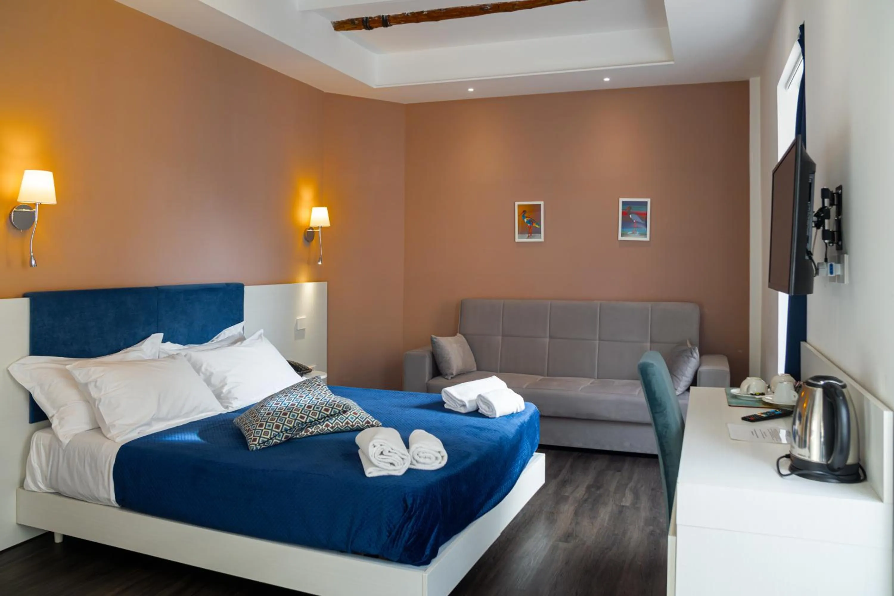 Bed in Palazzo Cappuccini Art Relais