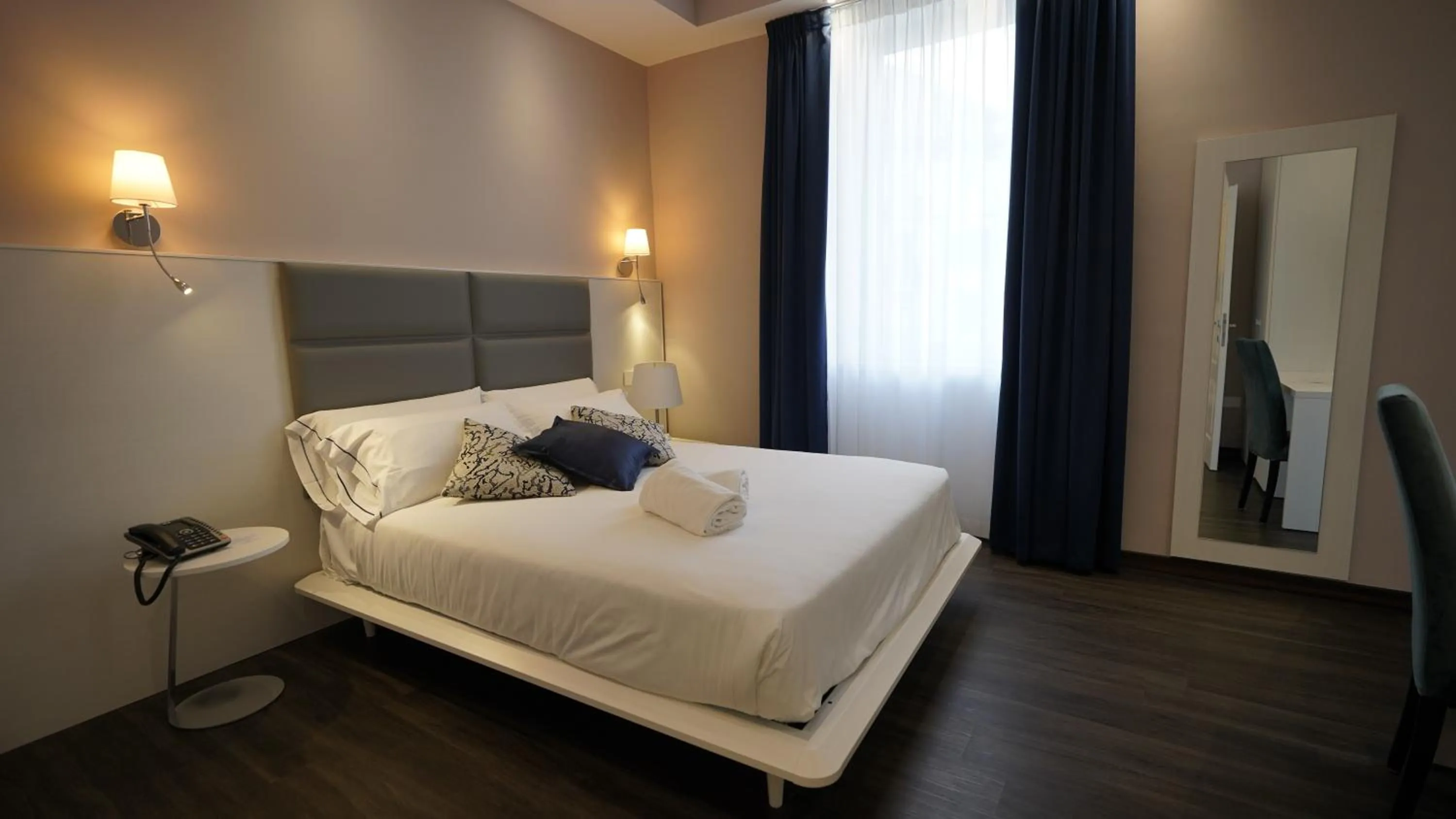 Bed in Palazzo Cappuccini Art Relais