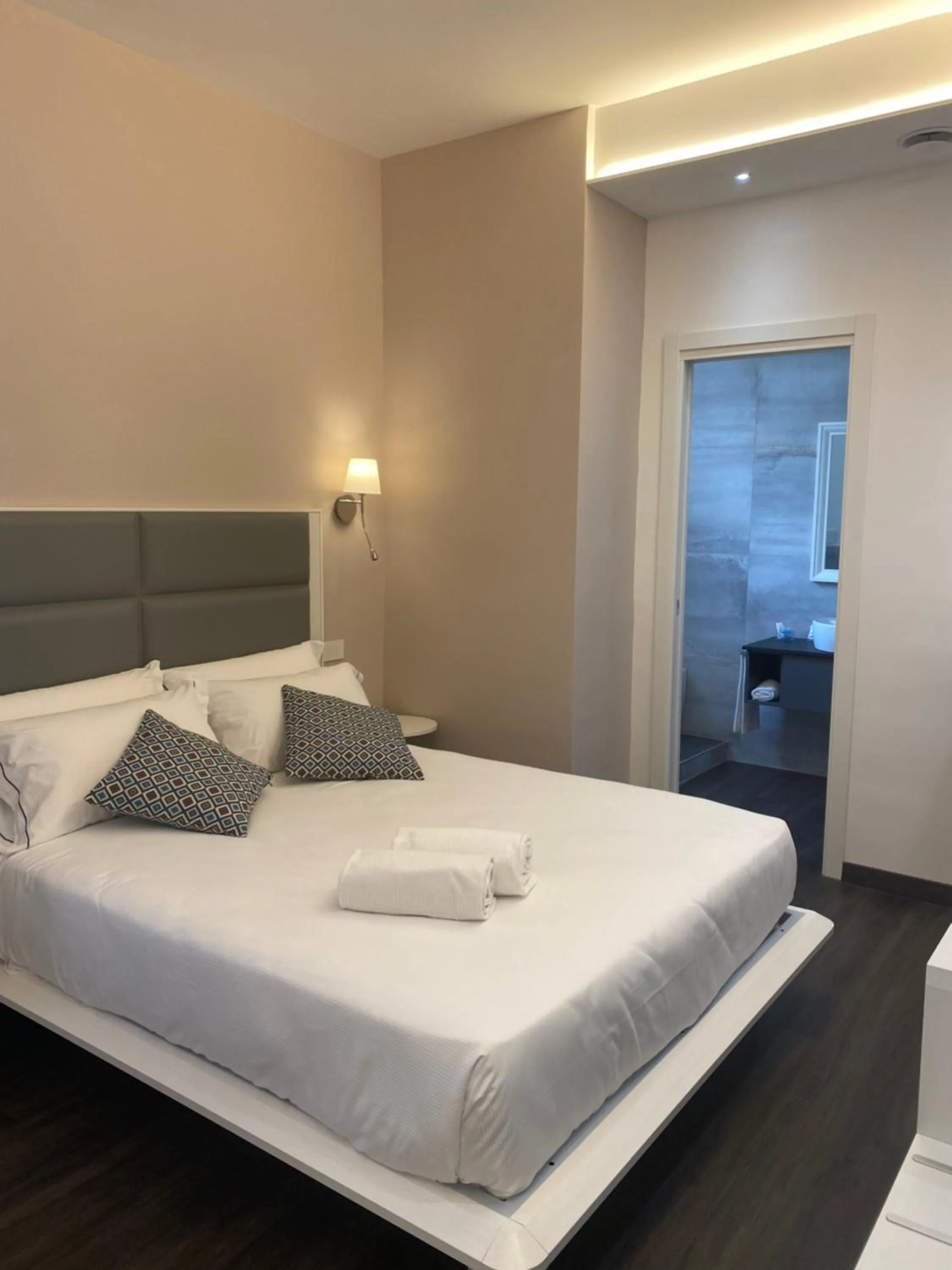 Bed in Palazzo Cappuccini Art Relais