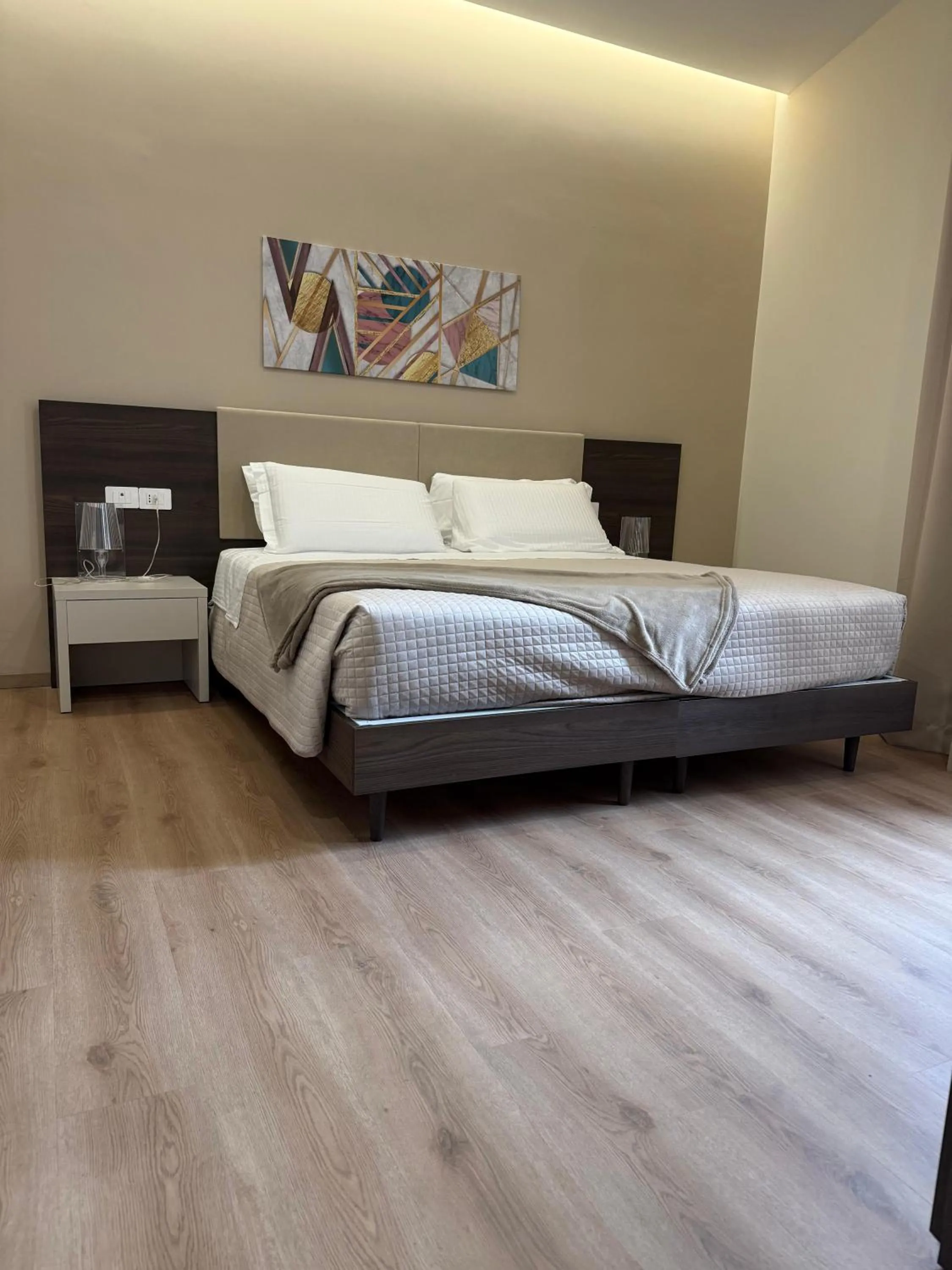 Bed in Palazzo Cappuccini Art Relais