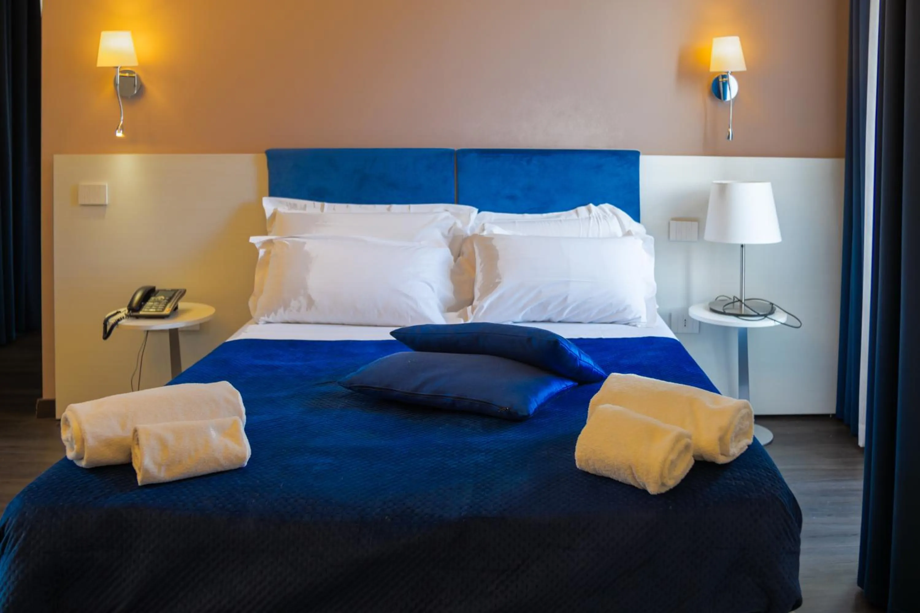 Bed in Palazzo Cappuccini Art Relais