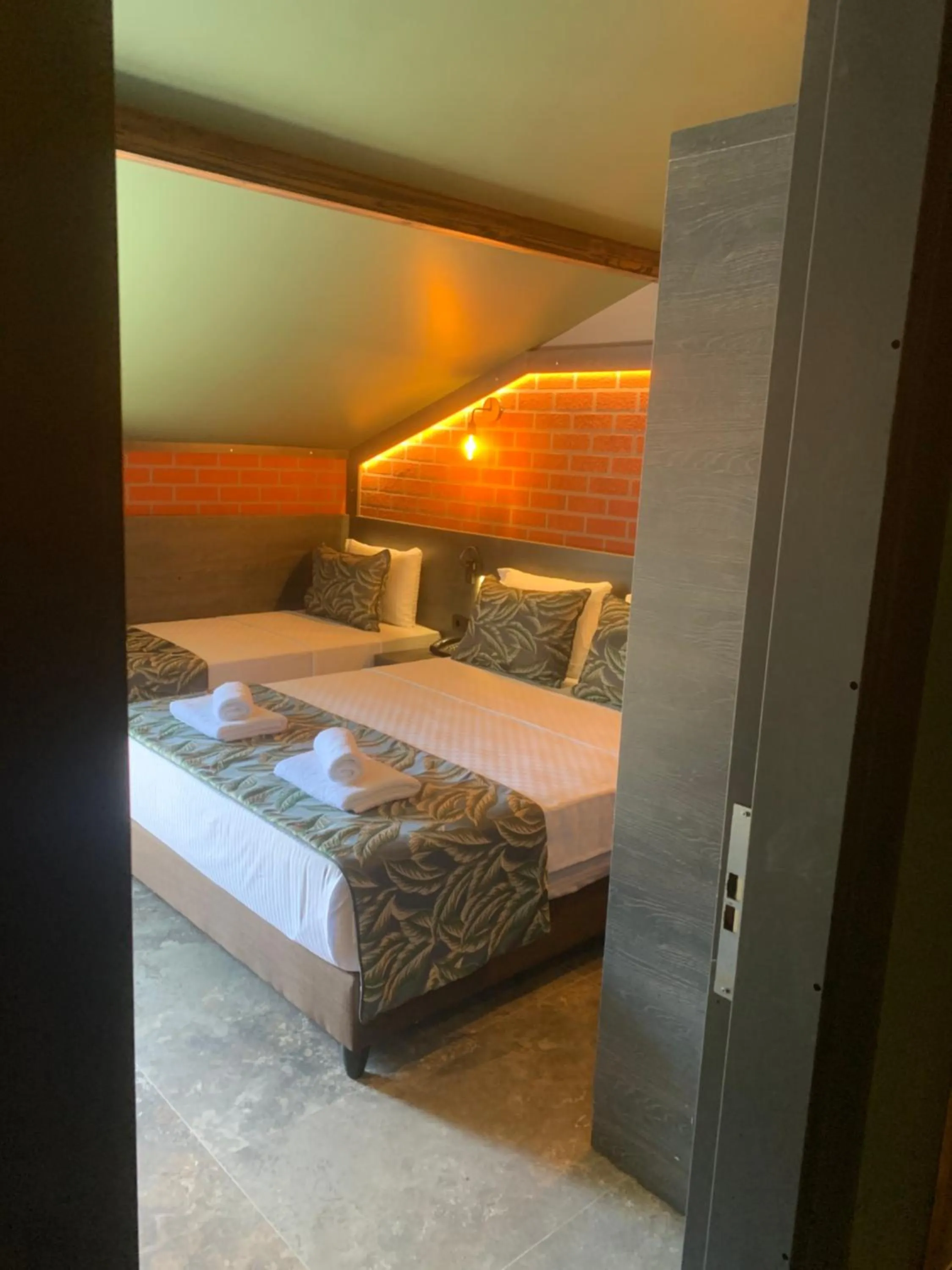 Bed in Dolphin Park Hotel