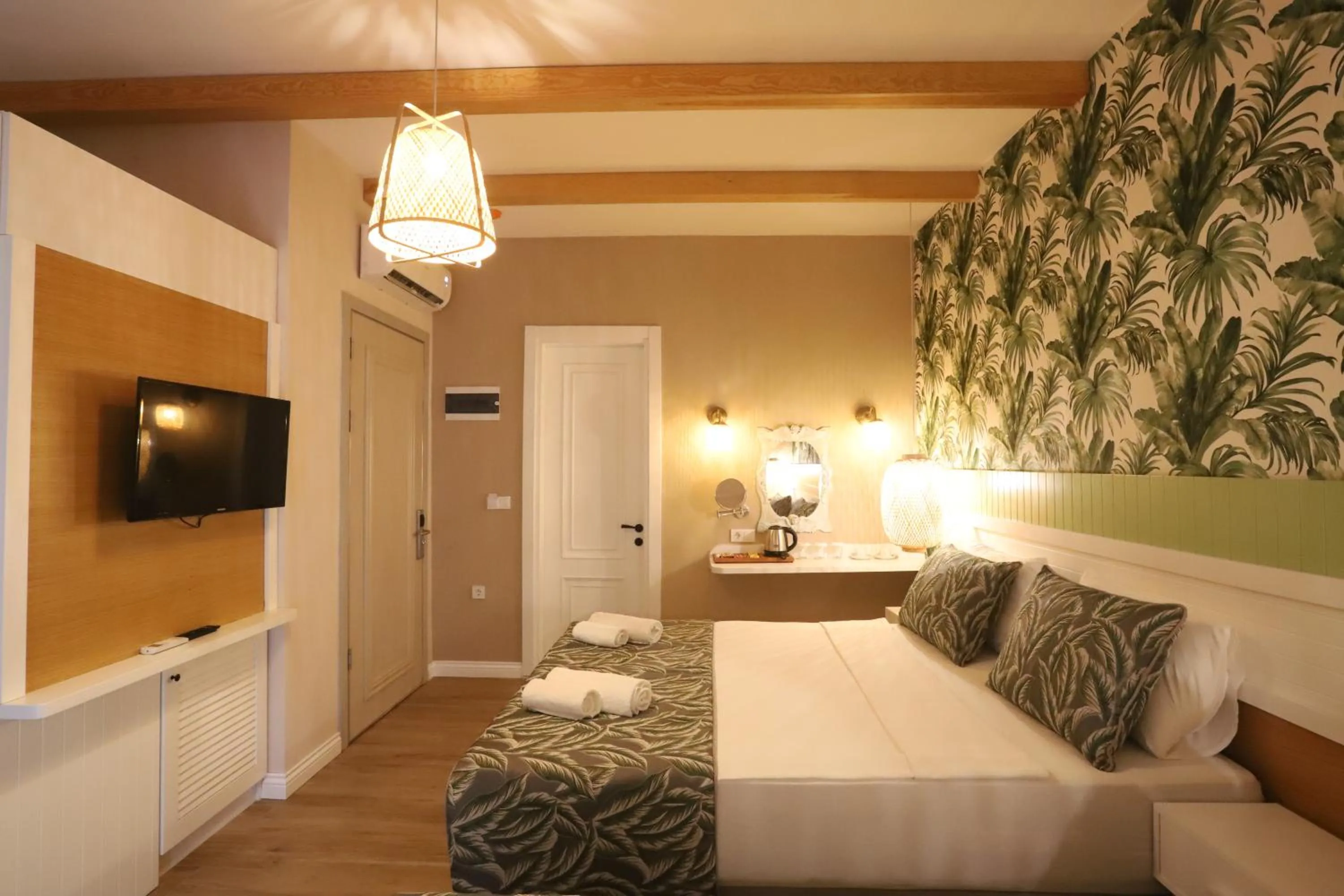 Bed in Dolphin Park Hotel