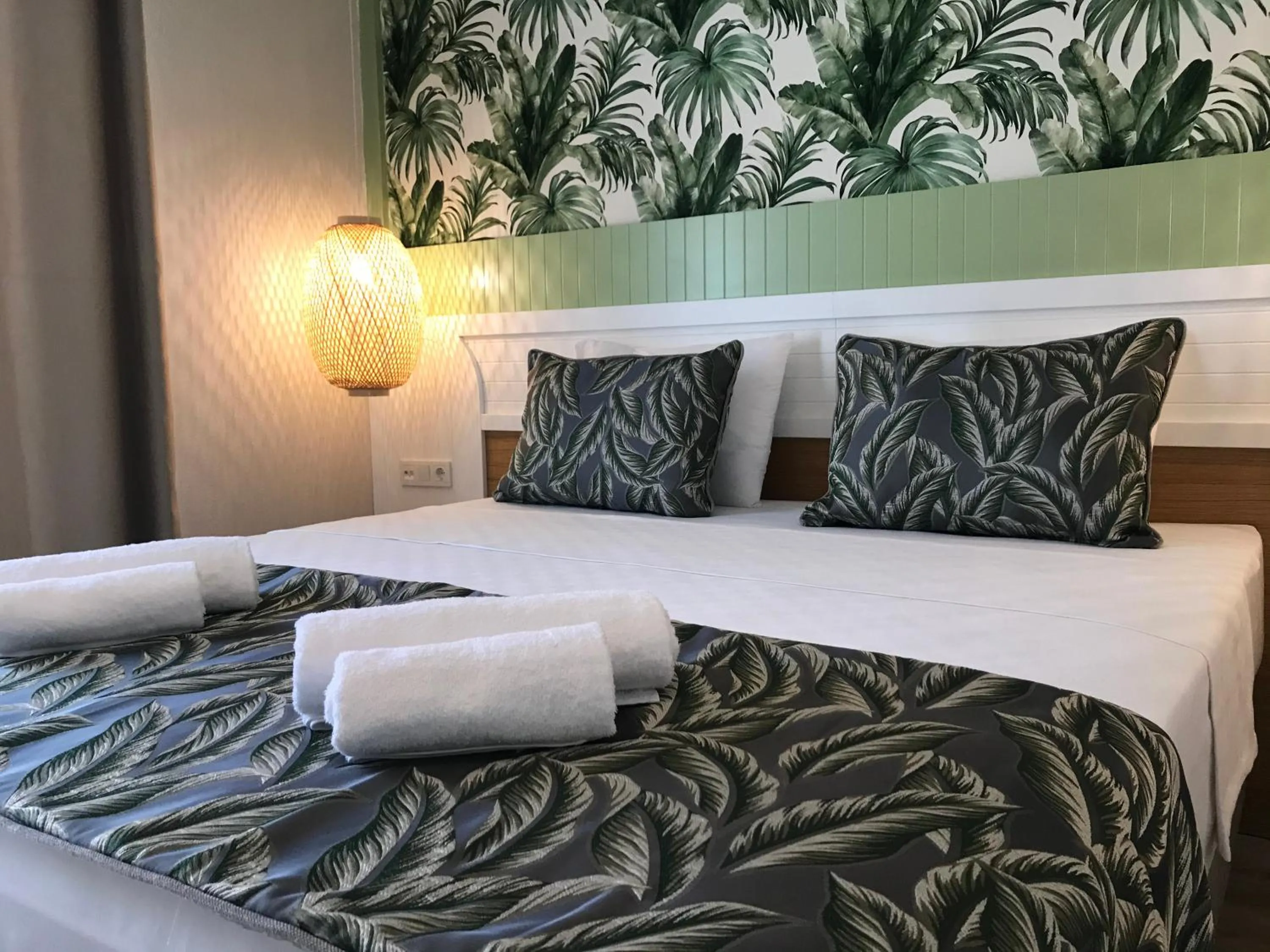 Bed in Dolphin Park Hotel