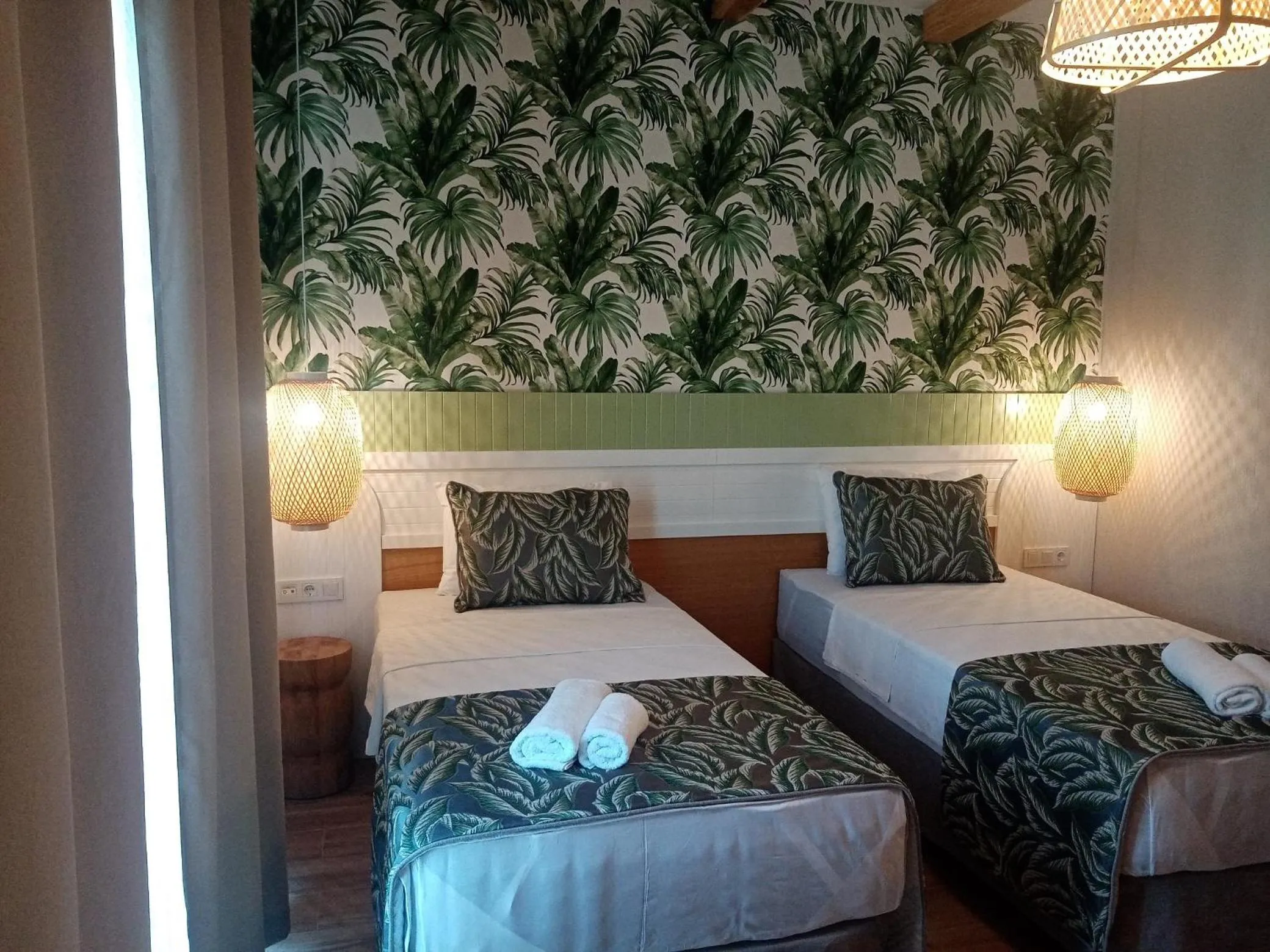 Bed in Dolphin Park Hotel