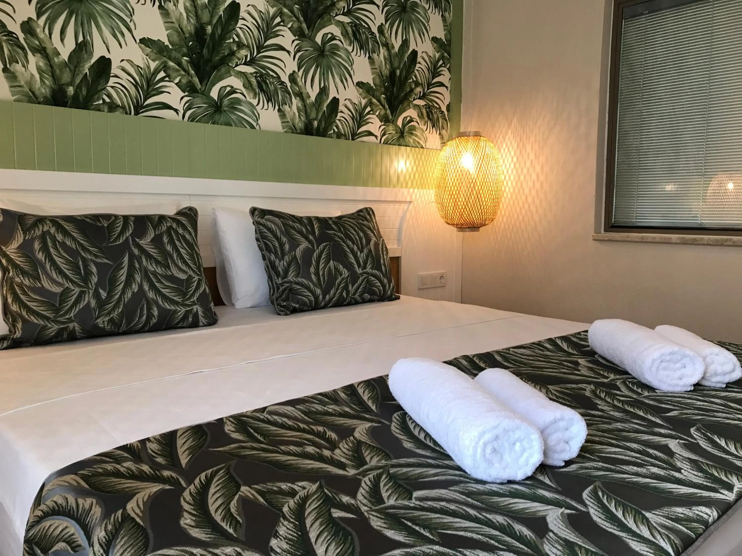 Bed in Dolphin Park Hotel