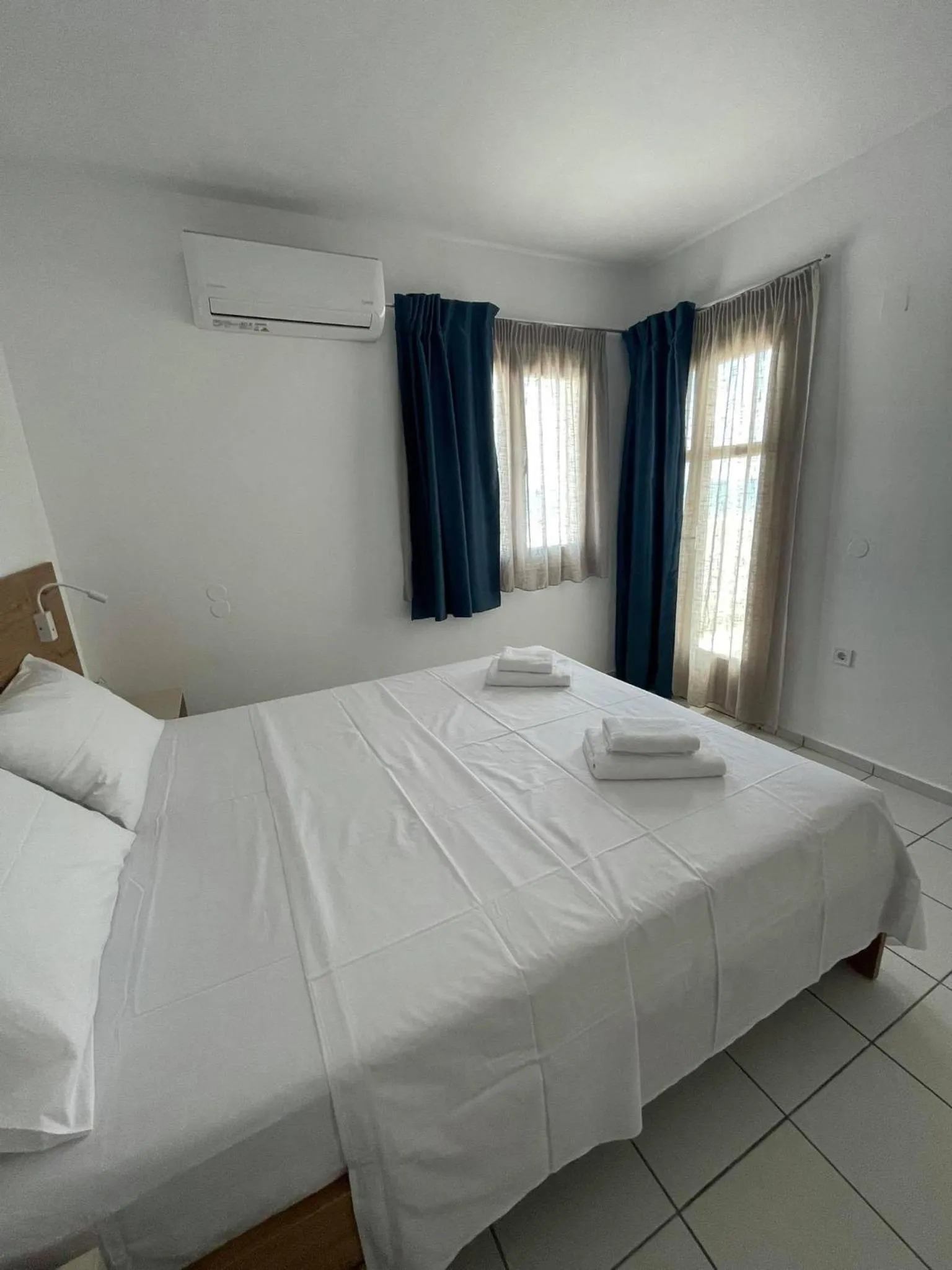 Bed in Coralli Beach Hotel