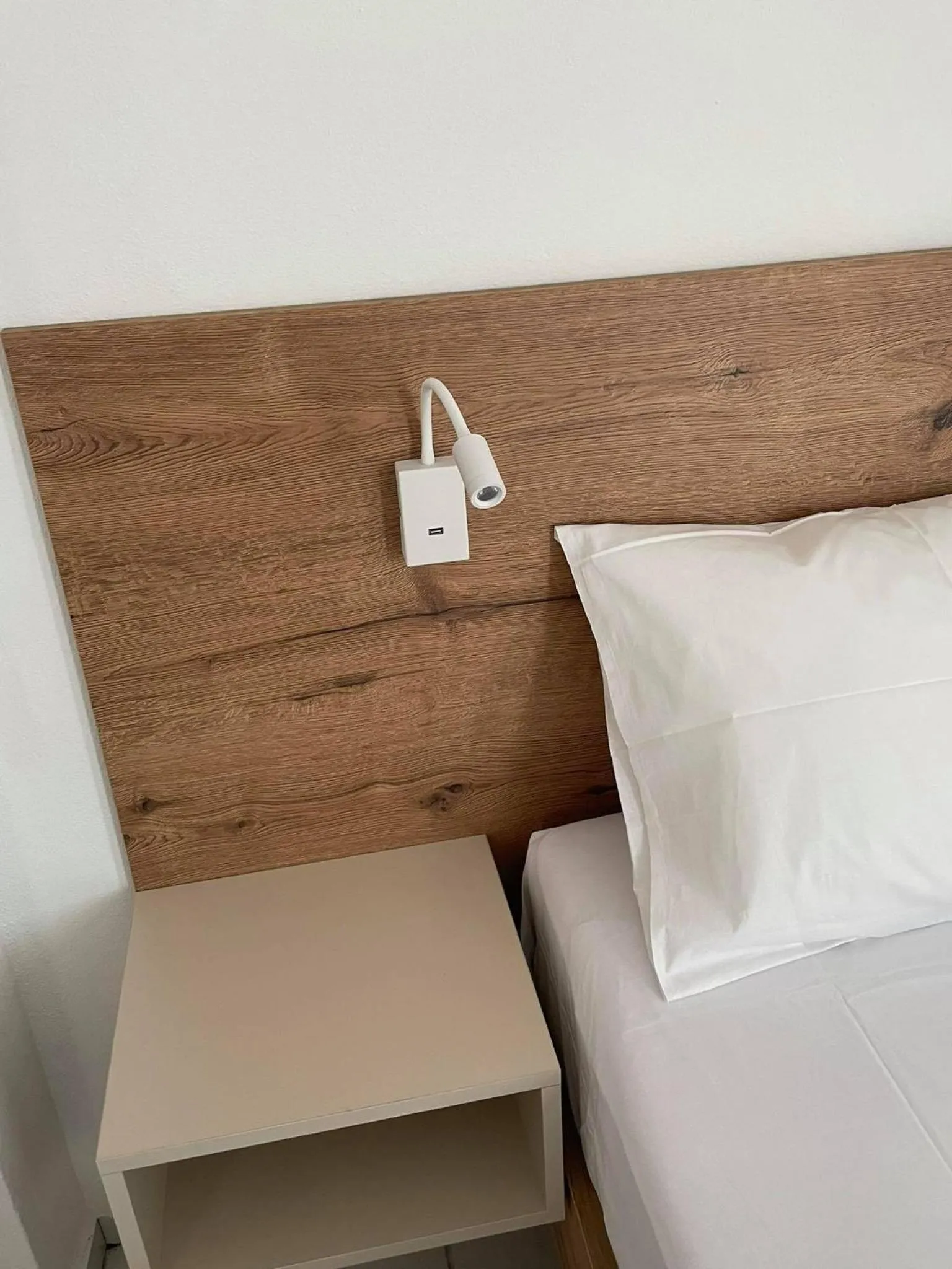 Bed in Coralli Beach Hotel