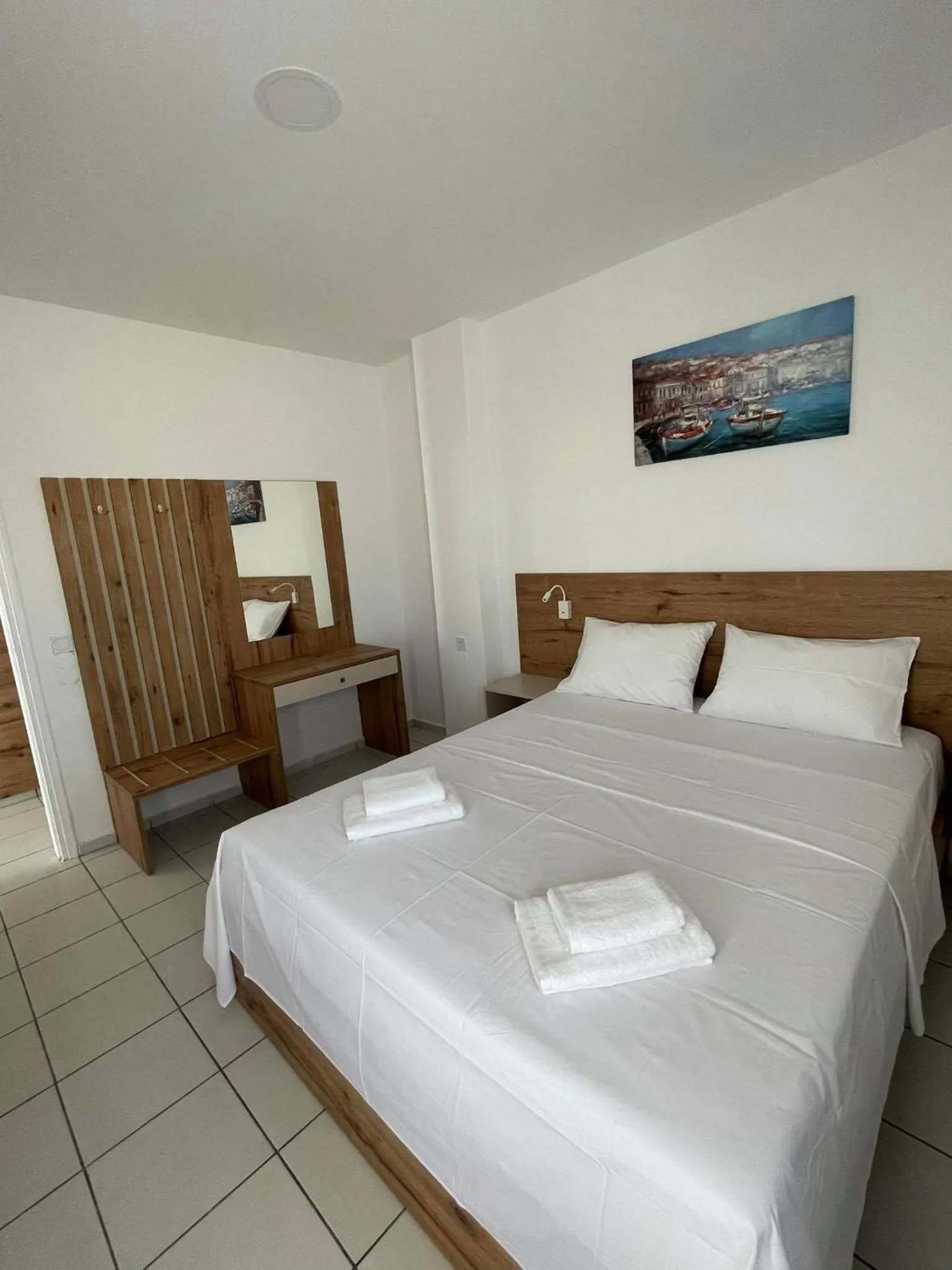 Bed in Coralli Beach Hotel