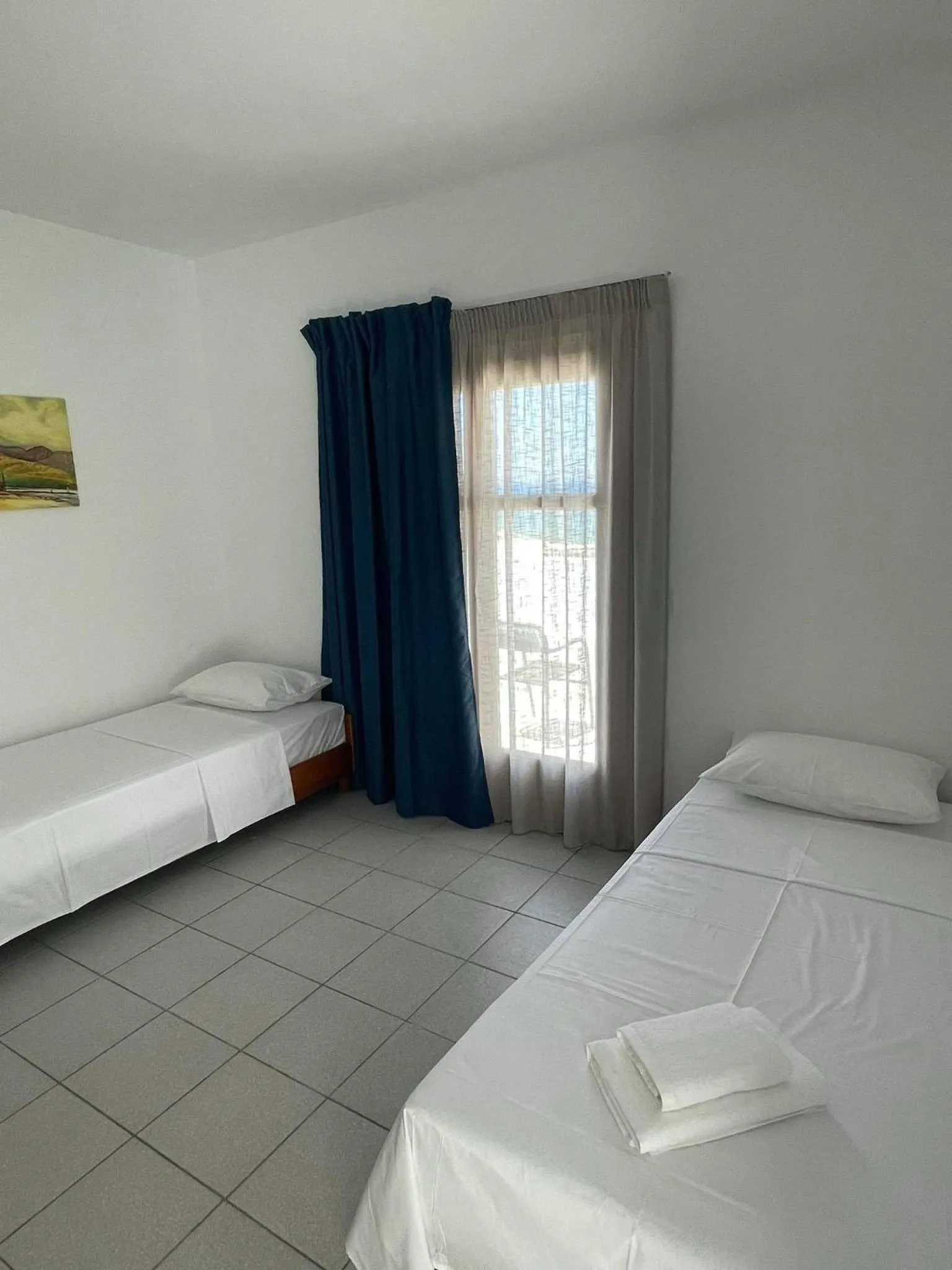 Bed in Coralli Beach Hotel