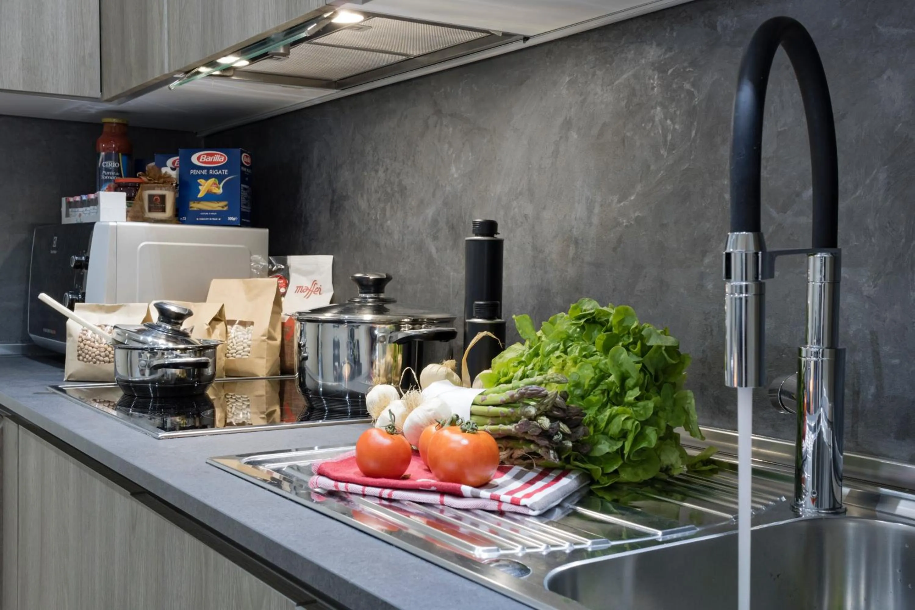 Kitchen or kitchenette in The Queen Luxury Apartments - Villa Liberty