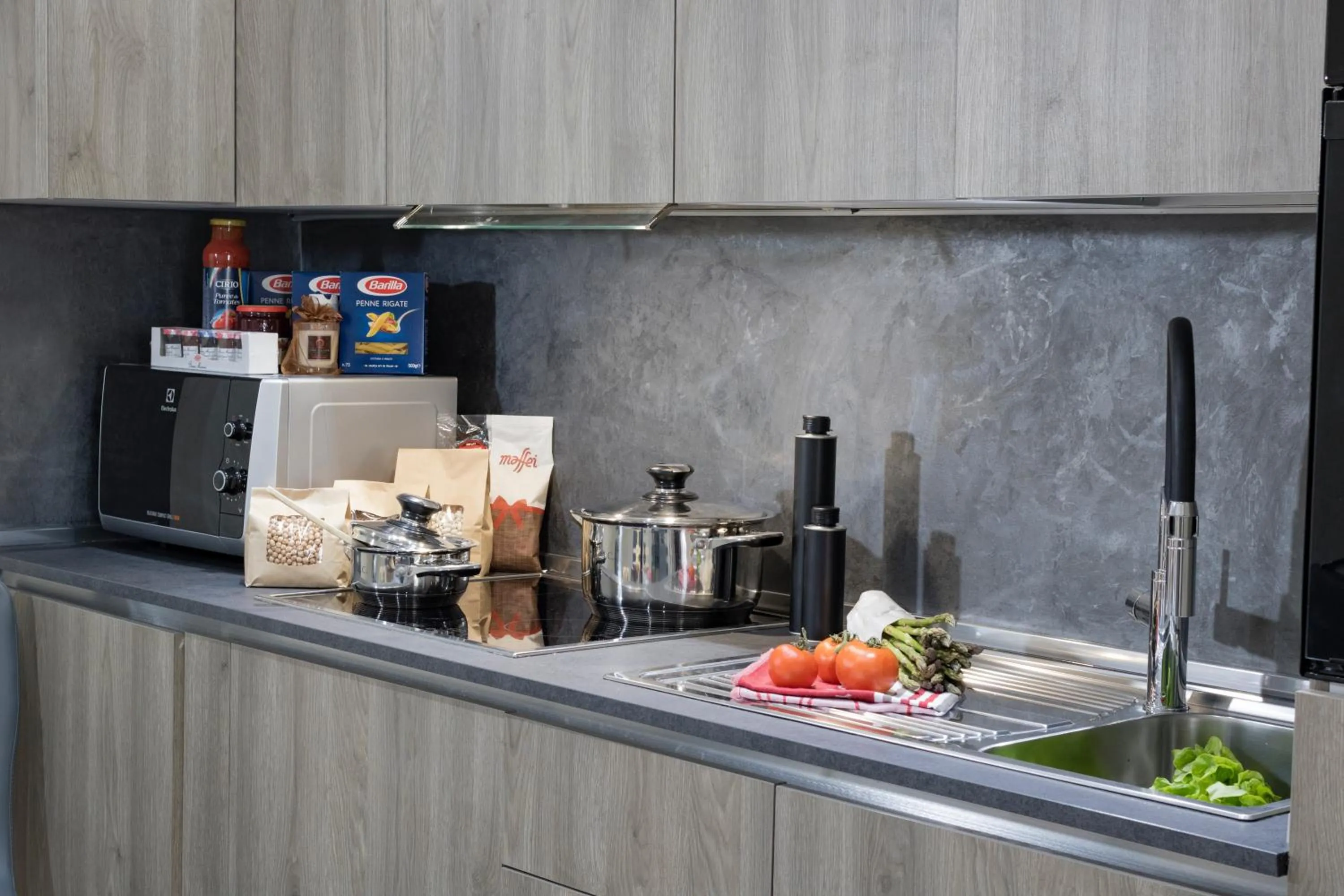 Kitchen or kitchenette in The Queen Luxury Apartments - Villa Liberty