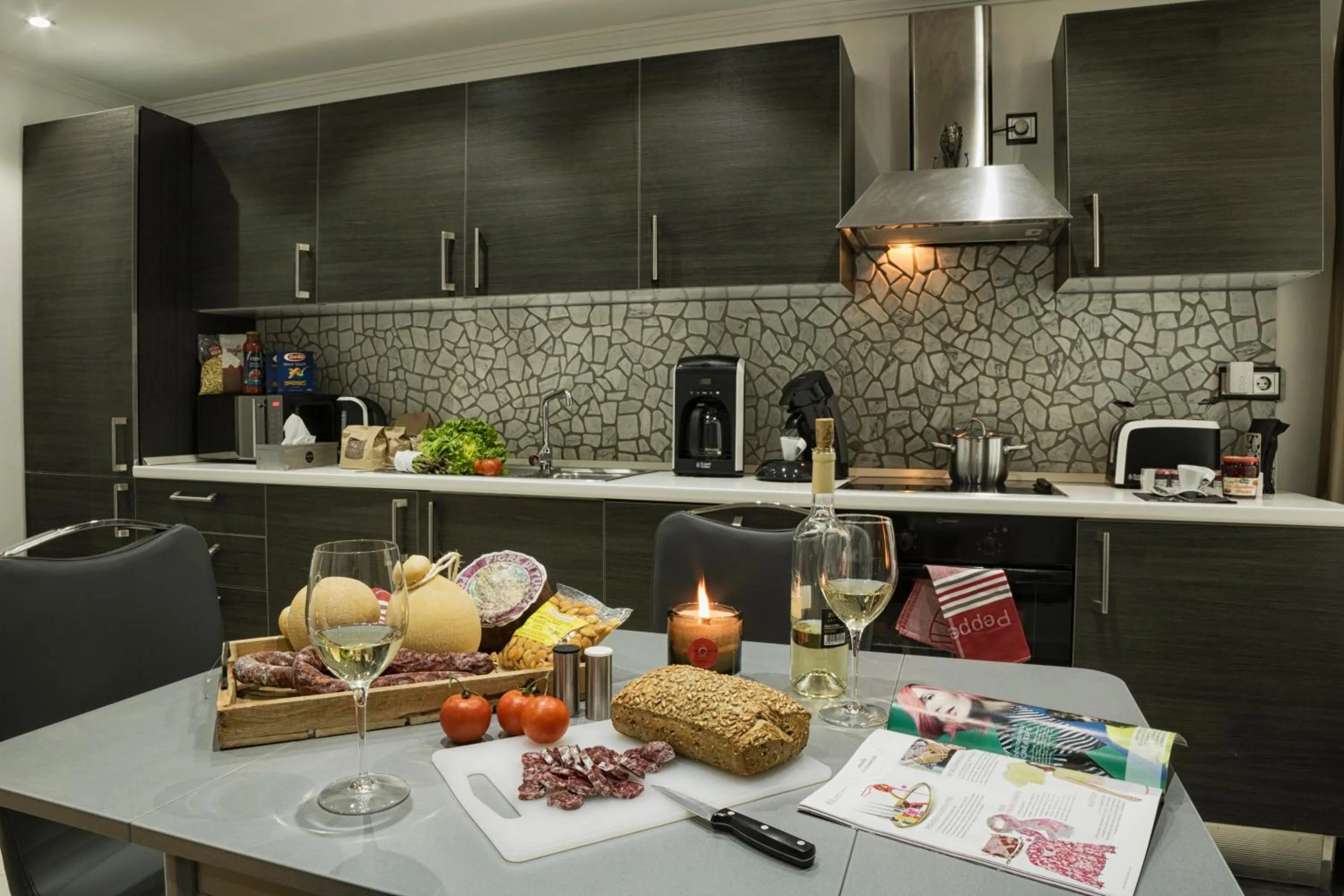 Kitchen or kitchenette in The Queen Luxury Apartments - Villa Liberty