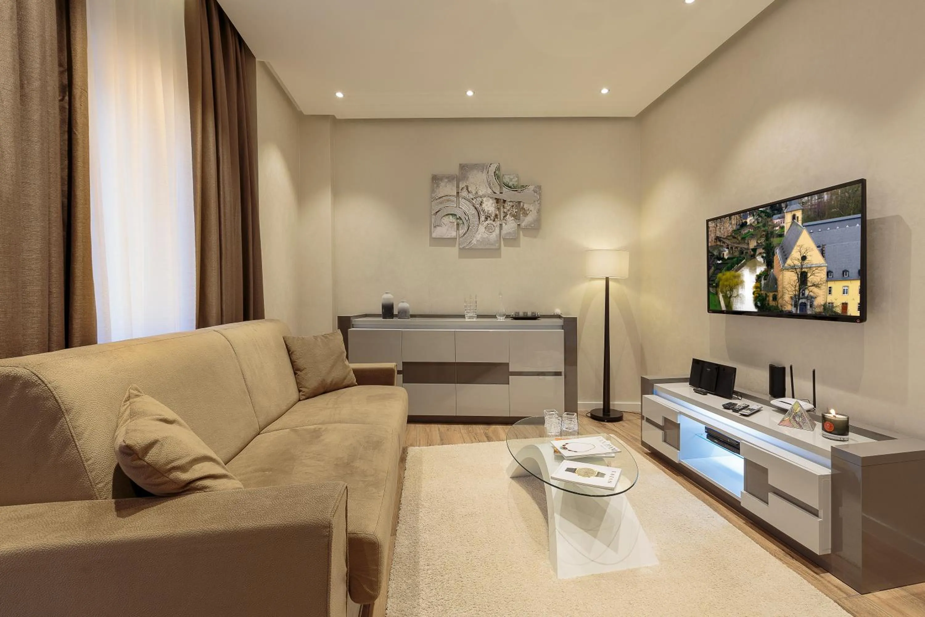 TV and multimedia in The Queen Luxury Apartments - Villa Liberty
