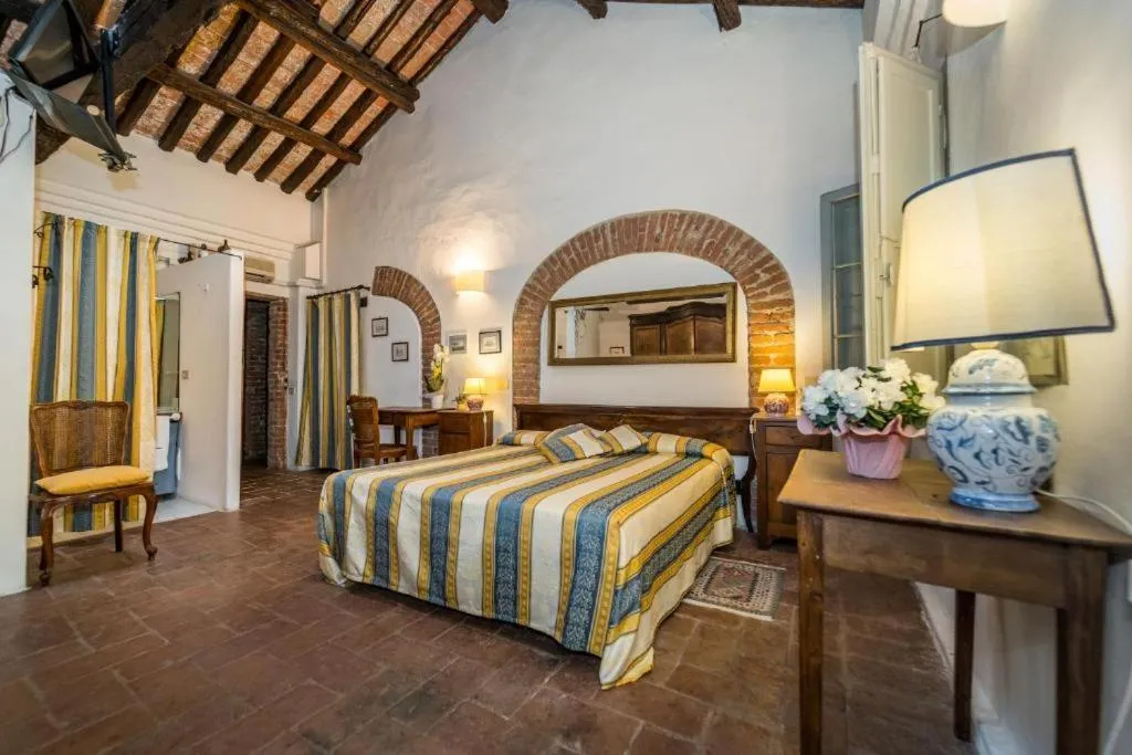 Bed in Agriturismo Tenuta Castel Venezze