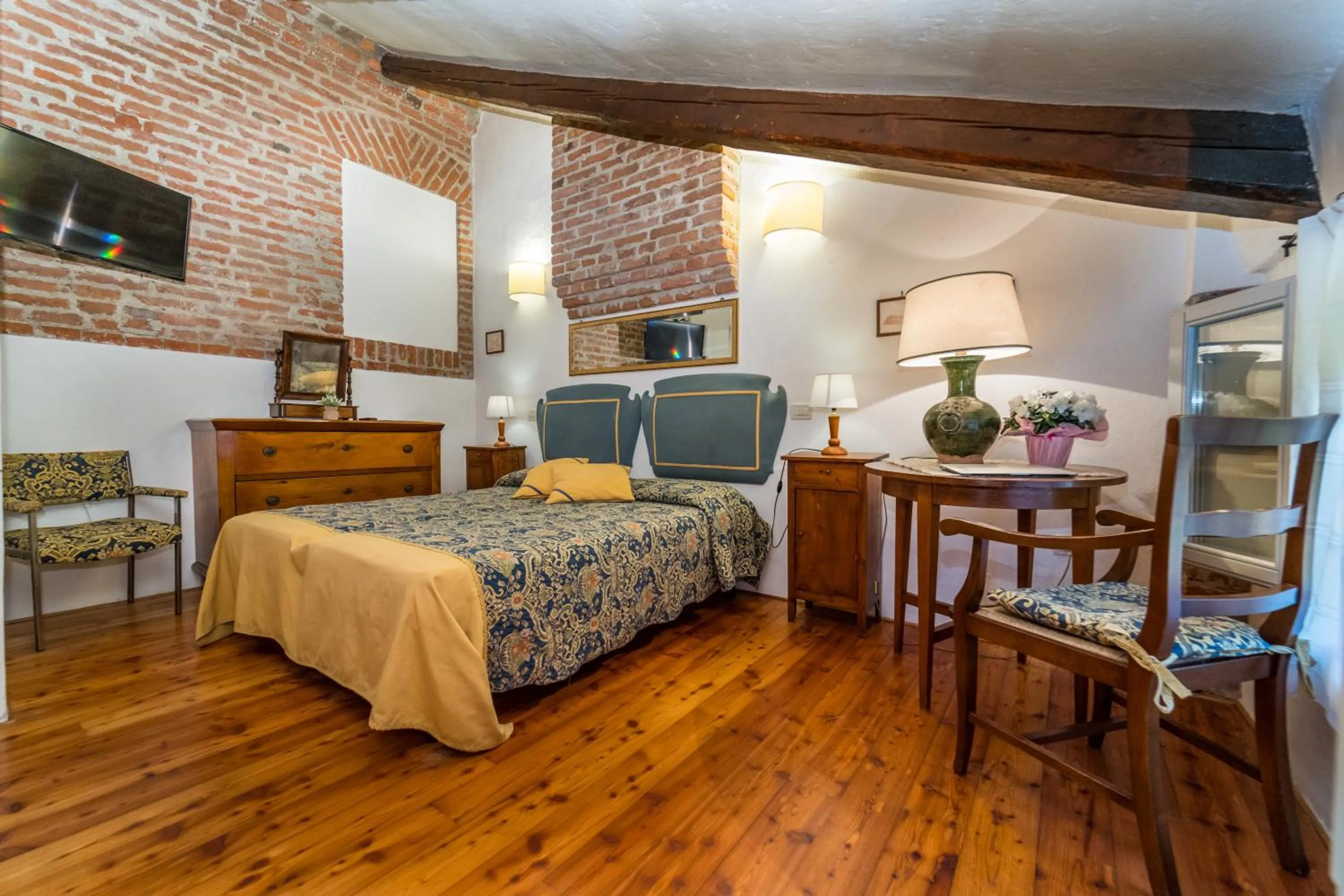 Photo of the whole room, Bed in Agriturismo Tenuta Castel Venezze