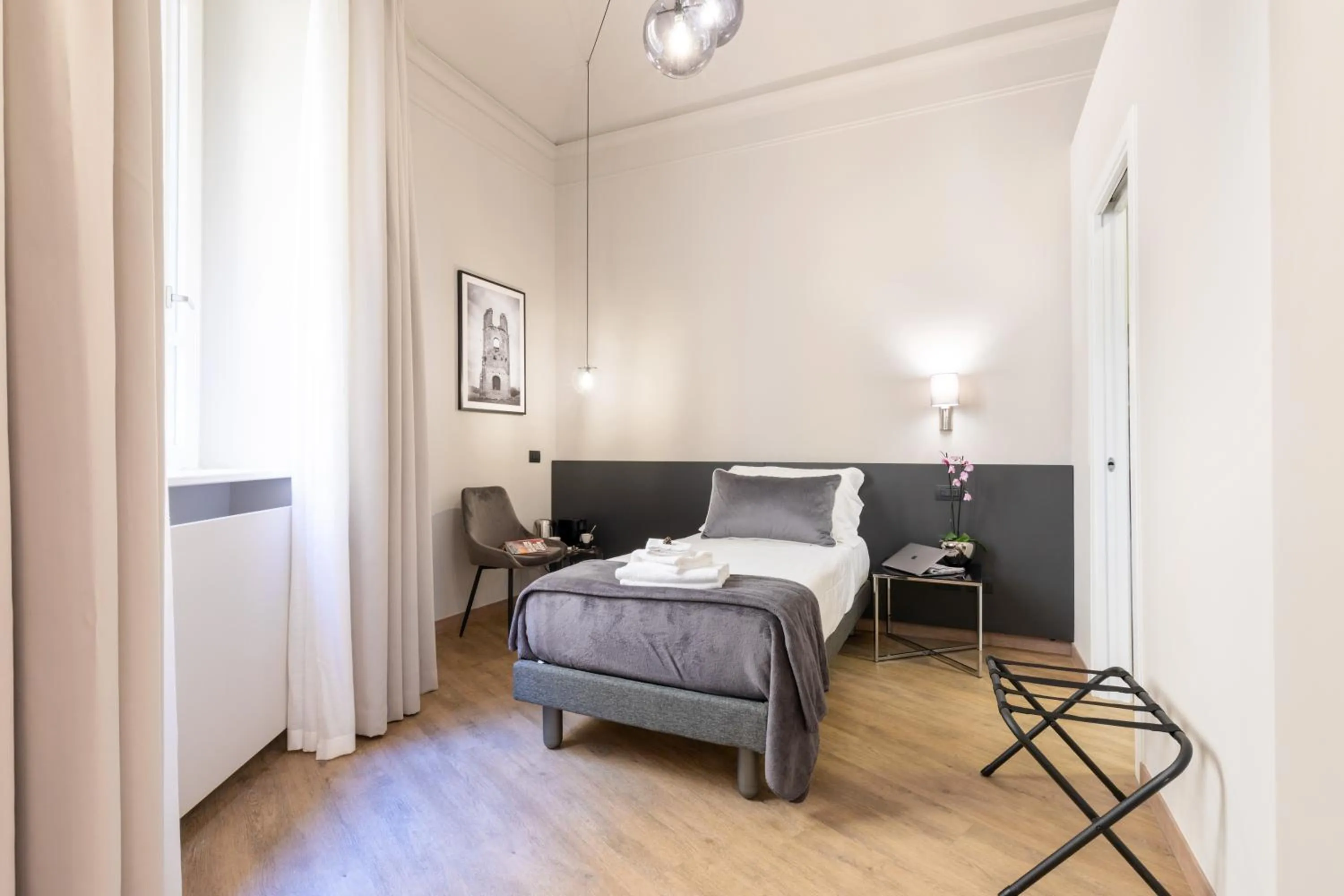 Bed in Foresteria di Piazza Cavour - Luxury Suites & Guest House