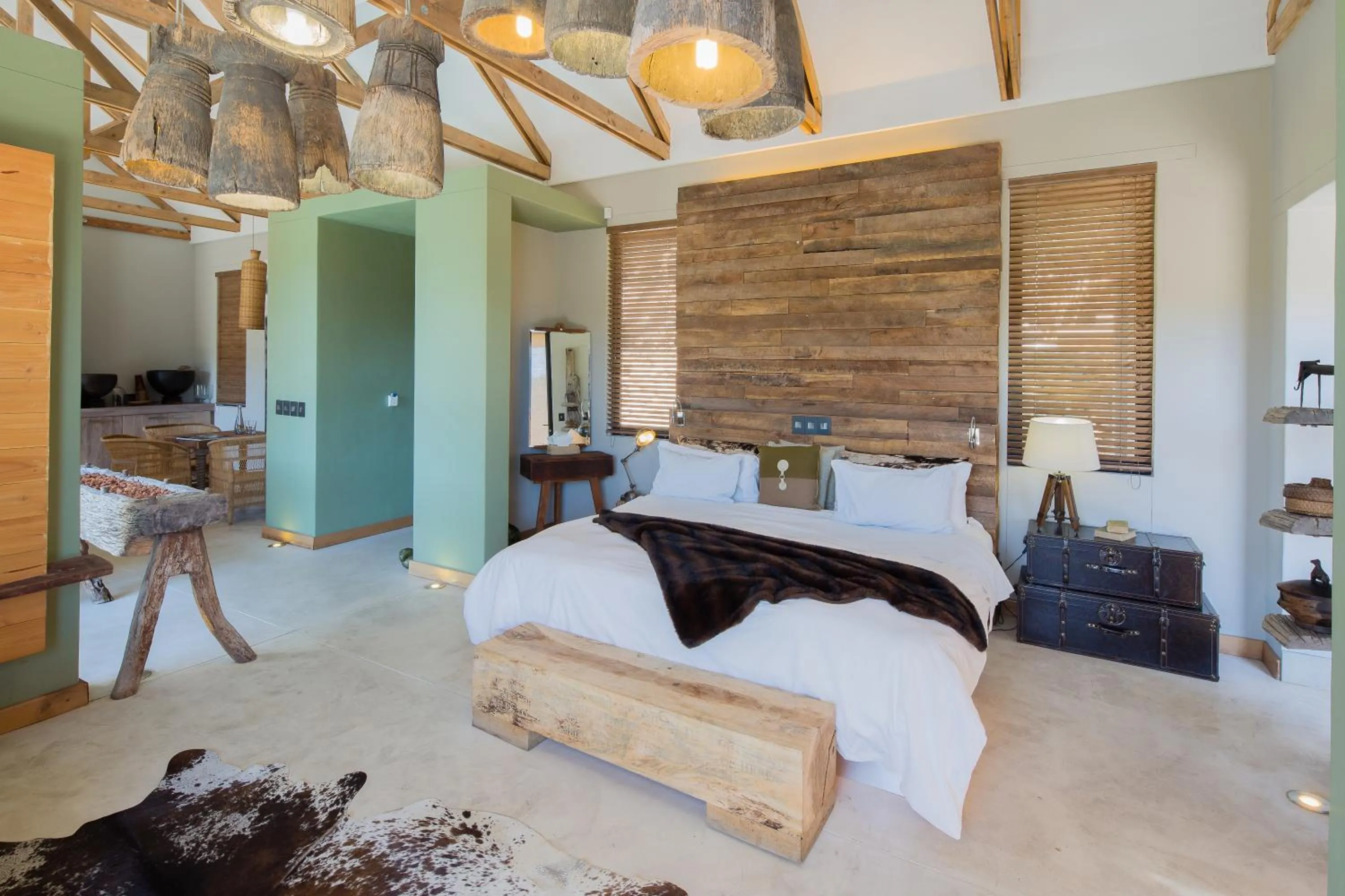 Bed in The Olive Exclusive All-Suite Hotel