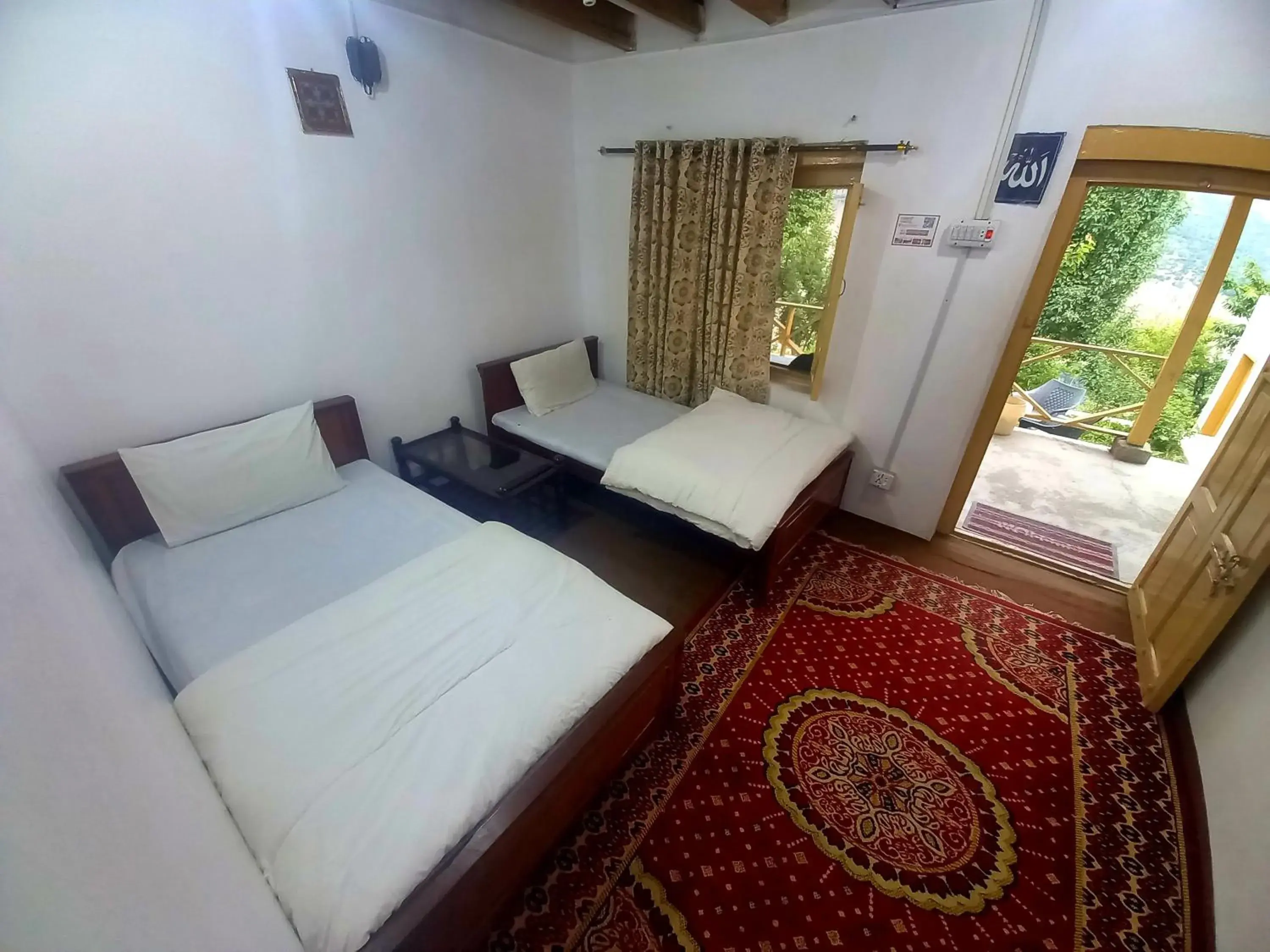 Twin Room with Mountain View in Tourist Cottage Hunza Twin Room with Mountain View in Tourist Cottage Hunza